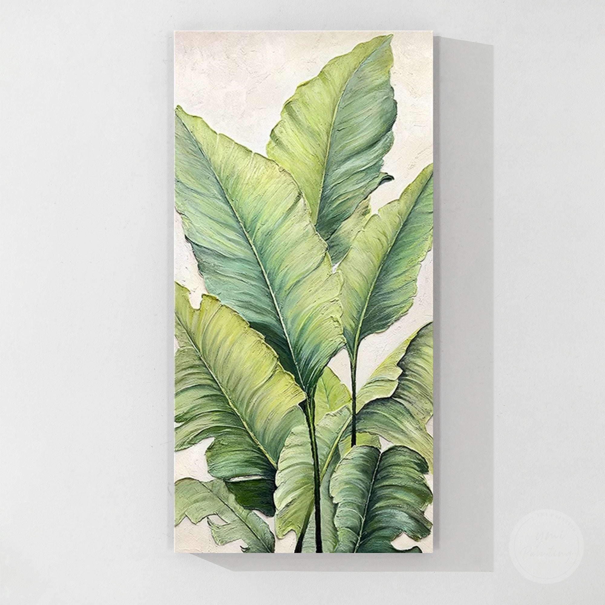 Premium botanical canvas painting with large tropical leaves and stylish contemporary interior design