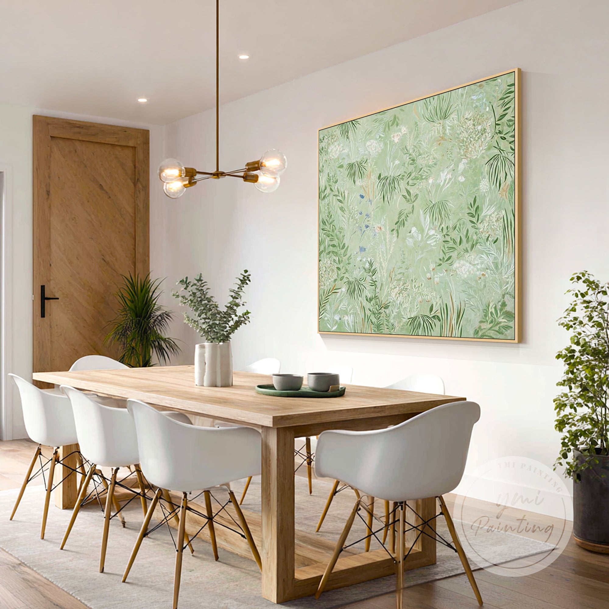 arte de parede de natureza verde suave acima do sofá numa sala de estar contemporânea