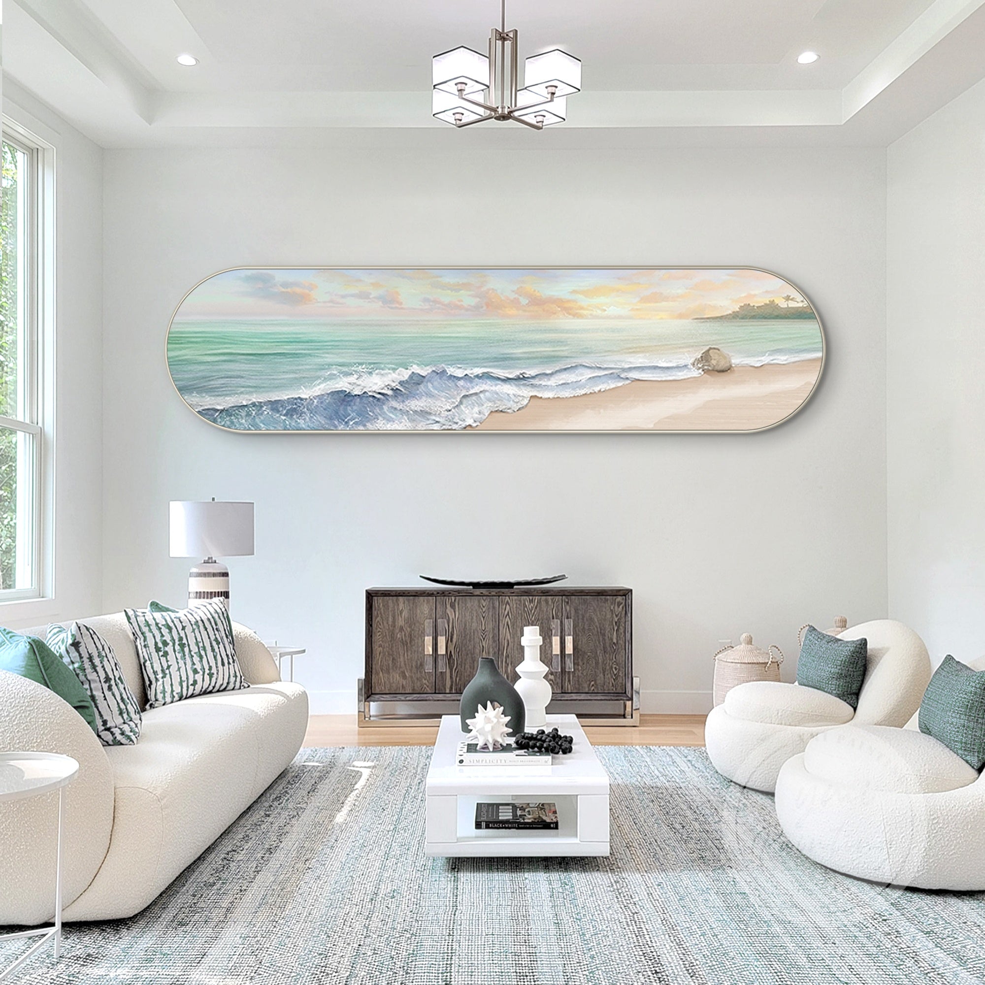 Coastal decor artwork with gentle waves and a peaceful atmosphere hang over the cozy sofa.