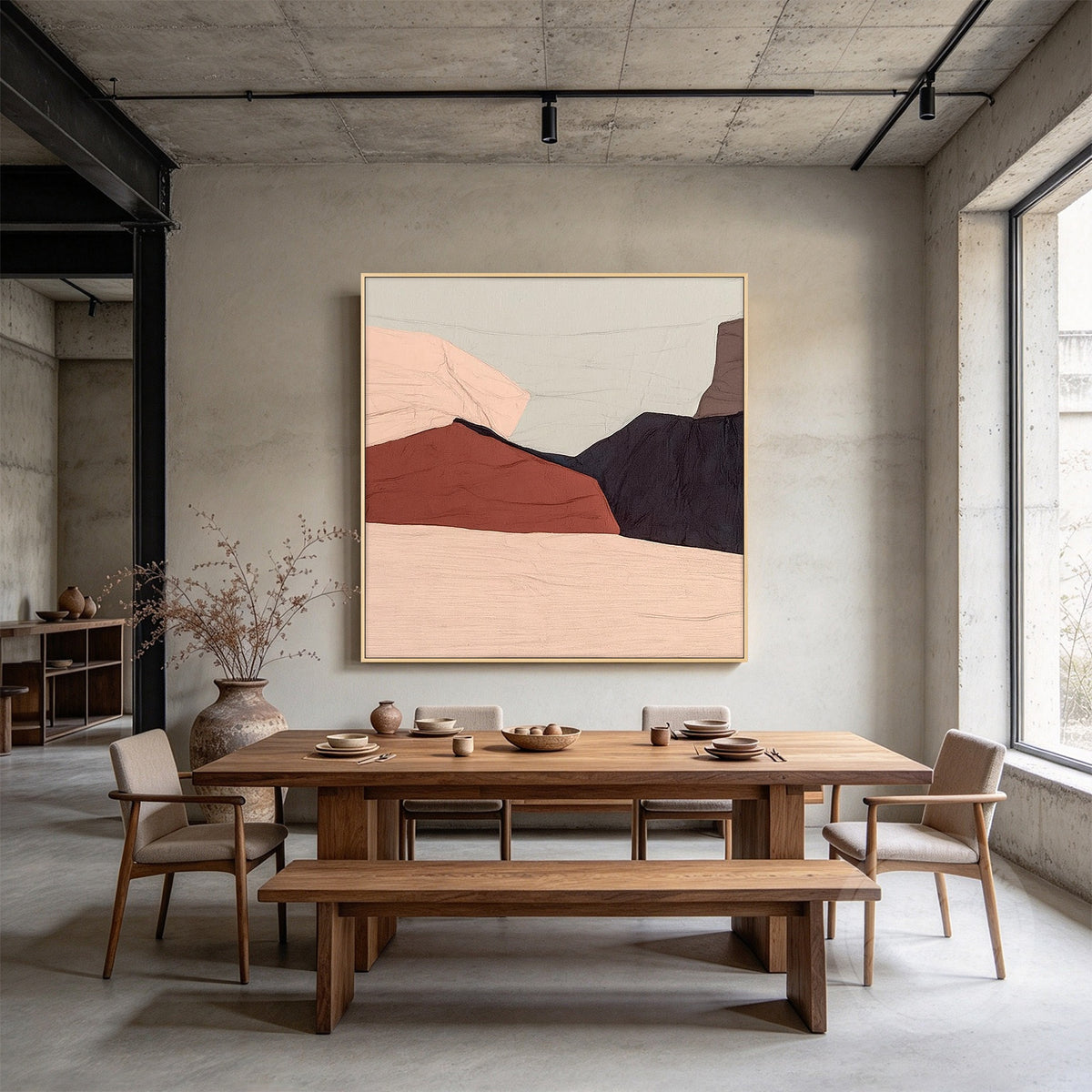 Terracotta abstract painting hanging above a bed in a warm neutral bedroom.