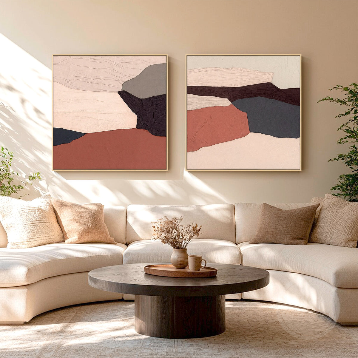 Terracotta diptych paintings hanging above a bed in a neutral bedroom.