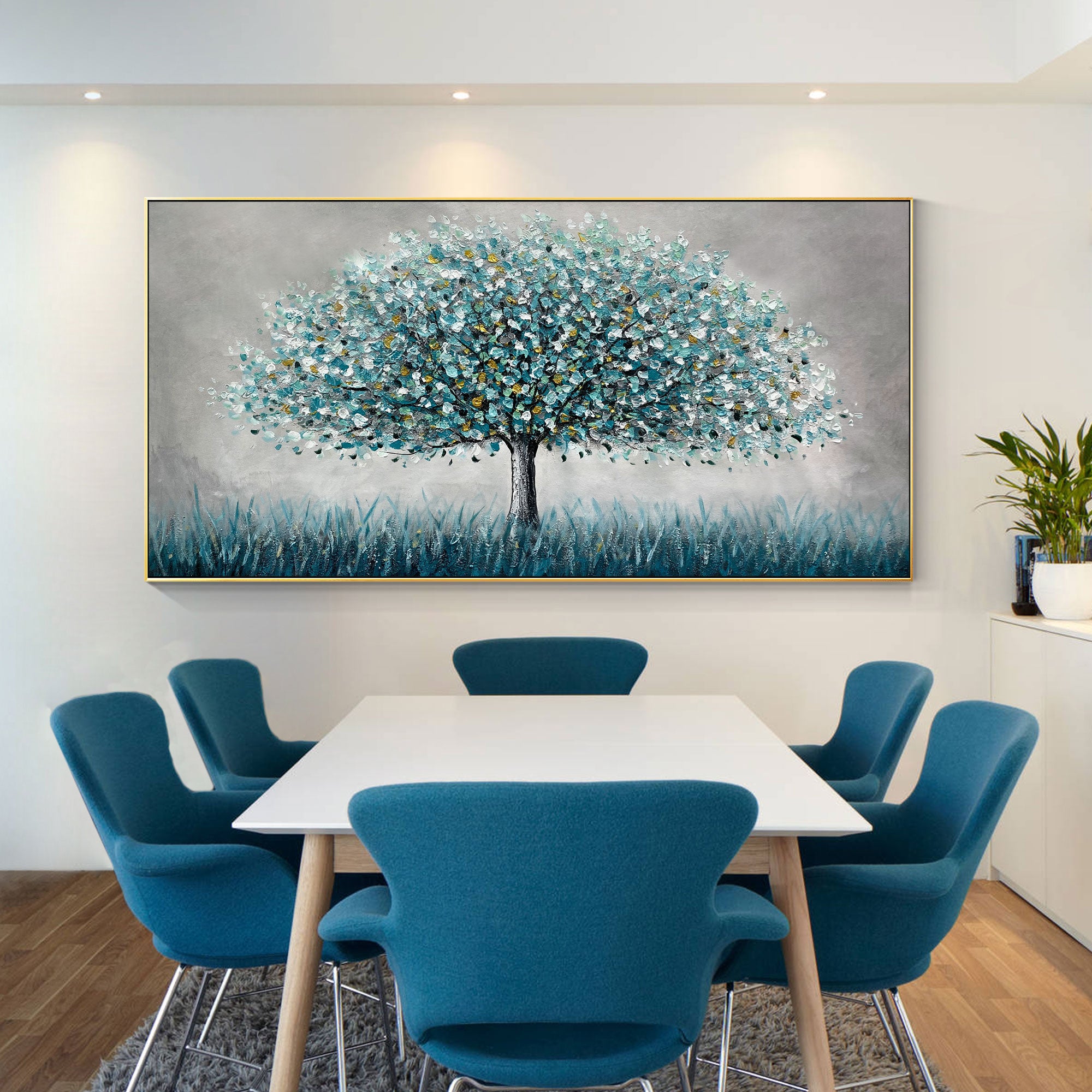 Arte de pared abstracto con árbol floreciente en azul y dorado