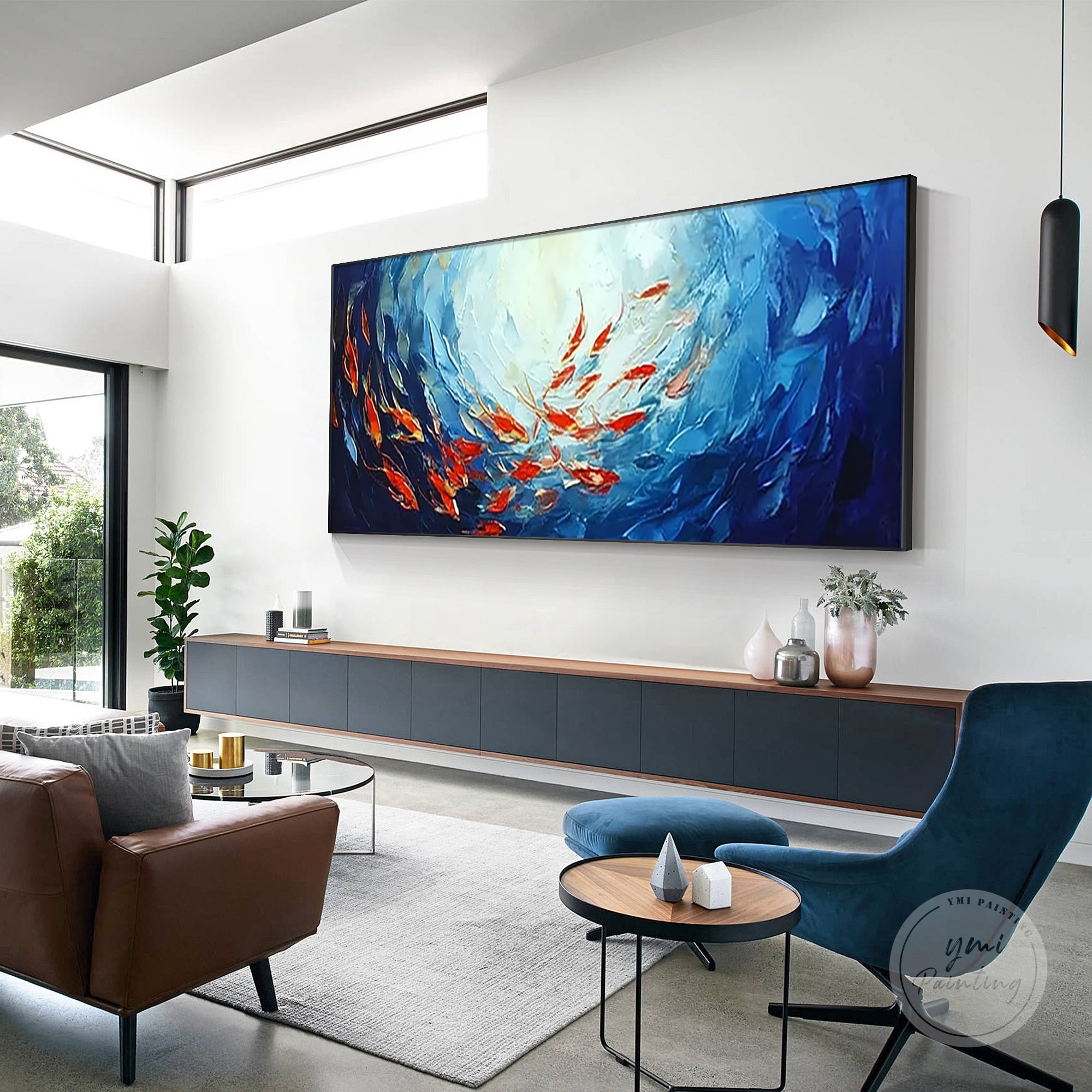 Abstract ocean scene with a school of red fish swimming through the navy blue sea.