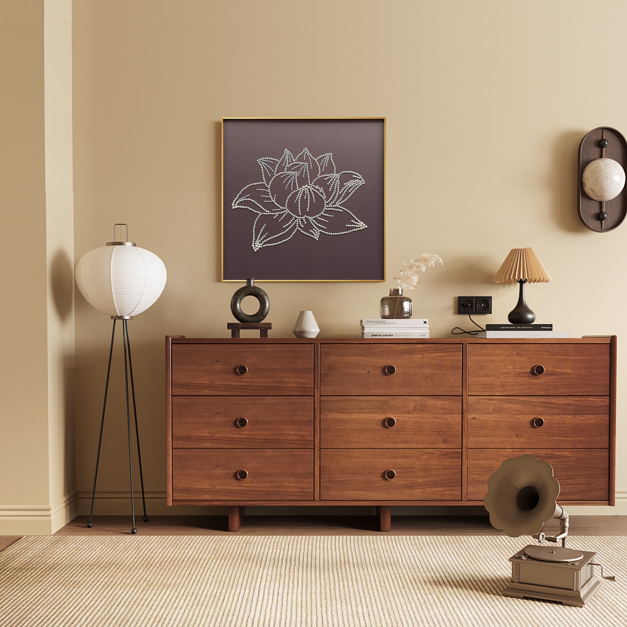 The 3D effect of the lotus flower, with carefully arranged pearls creating depth and texture above a wooden vintage cabinet.