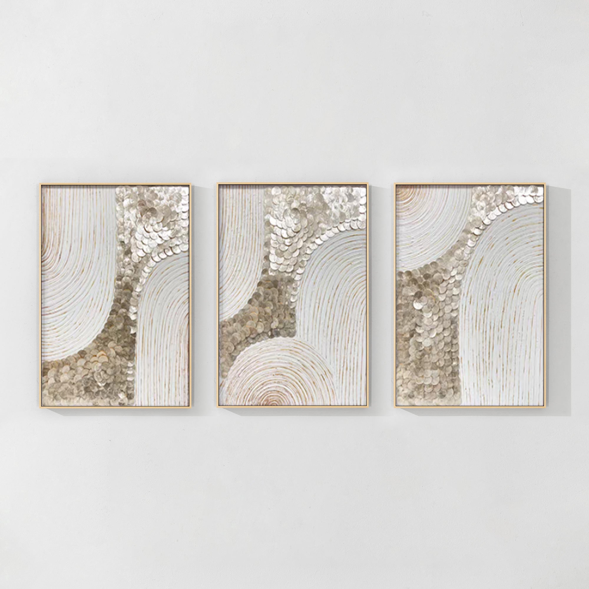 
Handcrafted 3D seashell art for a sophisticated and natural aesthetic, divided into three pieces that create a striking focal point.