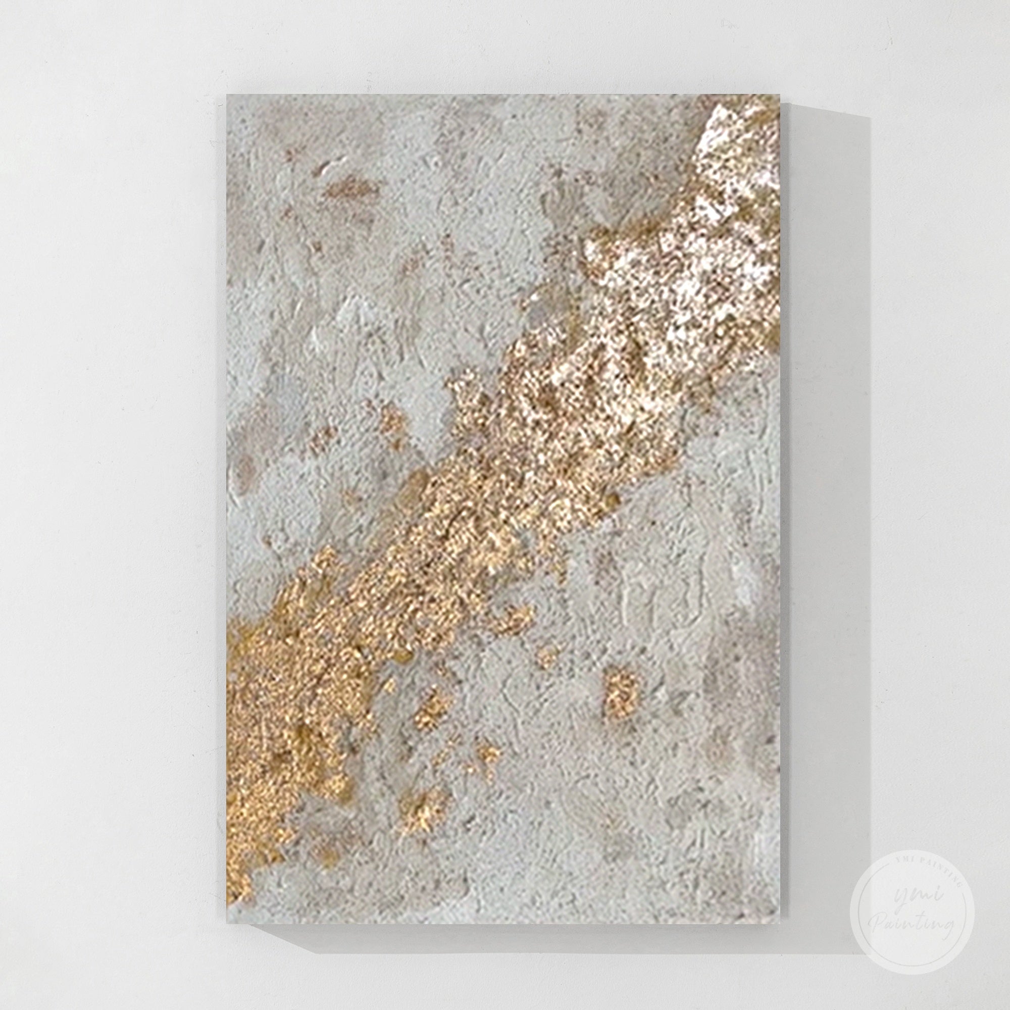Textured neutral canvas art with metallic gold highlights