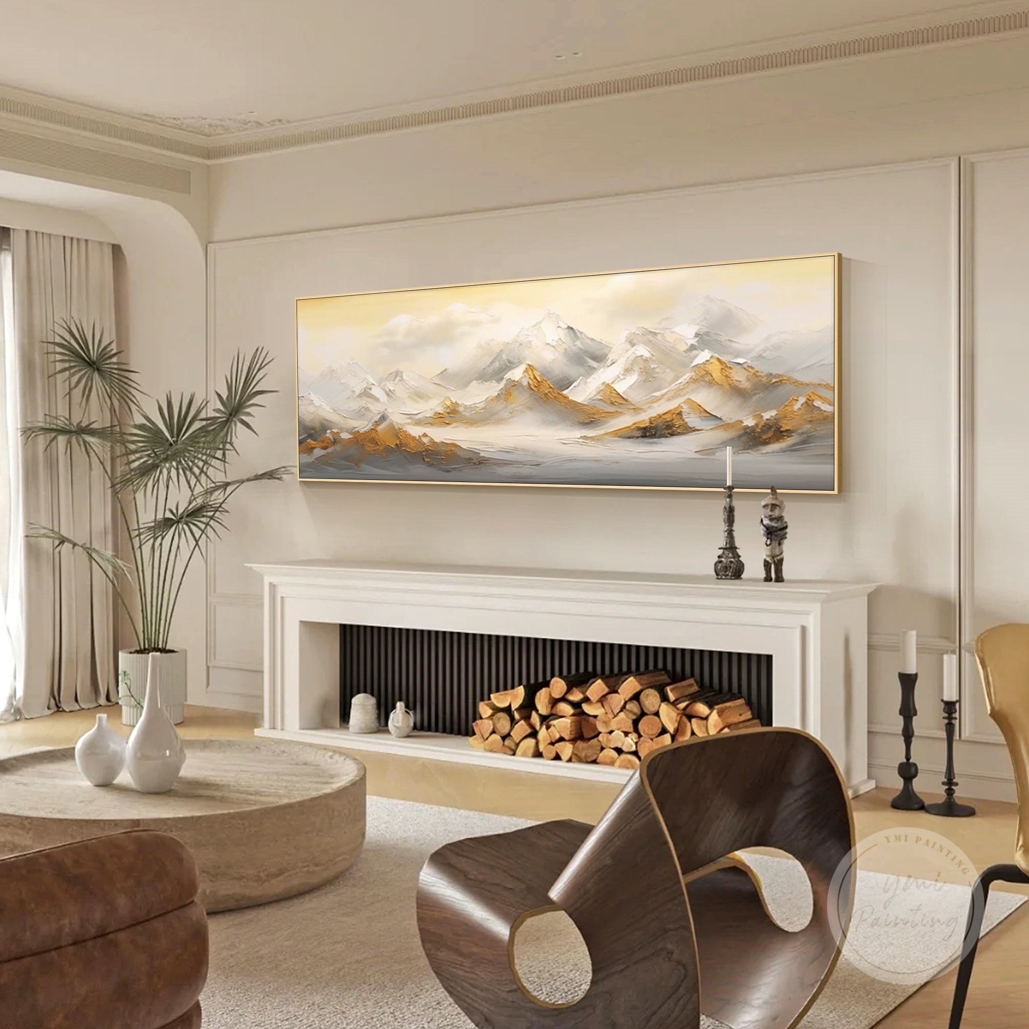 Horizontal mountain landscape artwork hanging above a minimalist sofa, refined housewarming gift