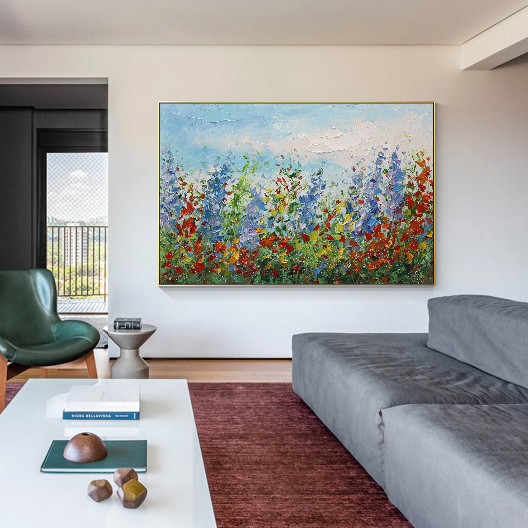 Blue and red abstract floral wall art creating a visual focus in a living room
