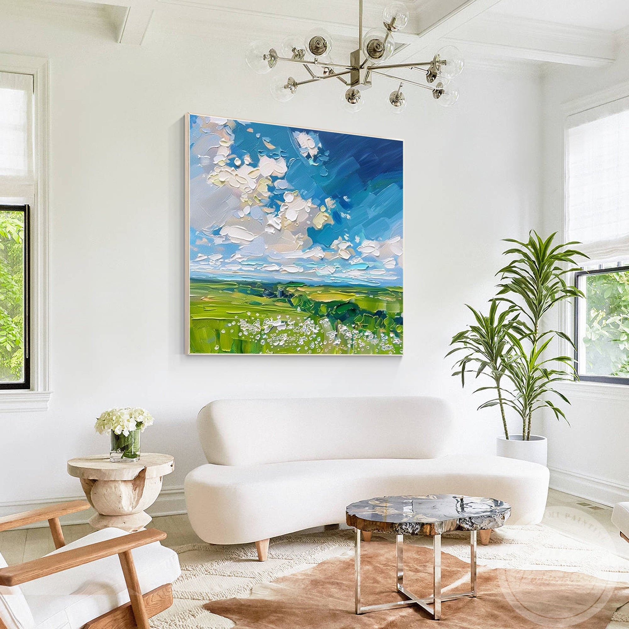 Bring a serene countryside feel to contemporary interiors with this abstract painting, featuring textured wildflowers and a vibrant blue sky.