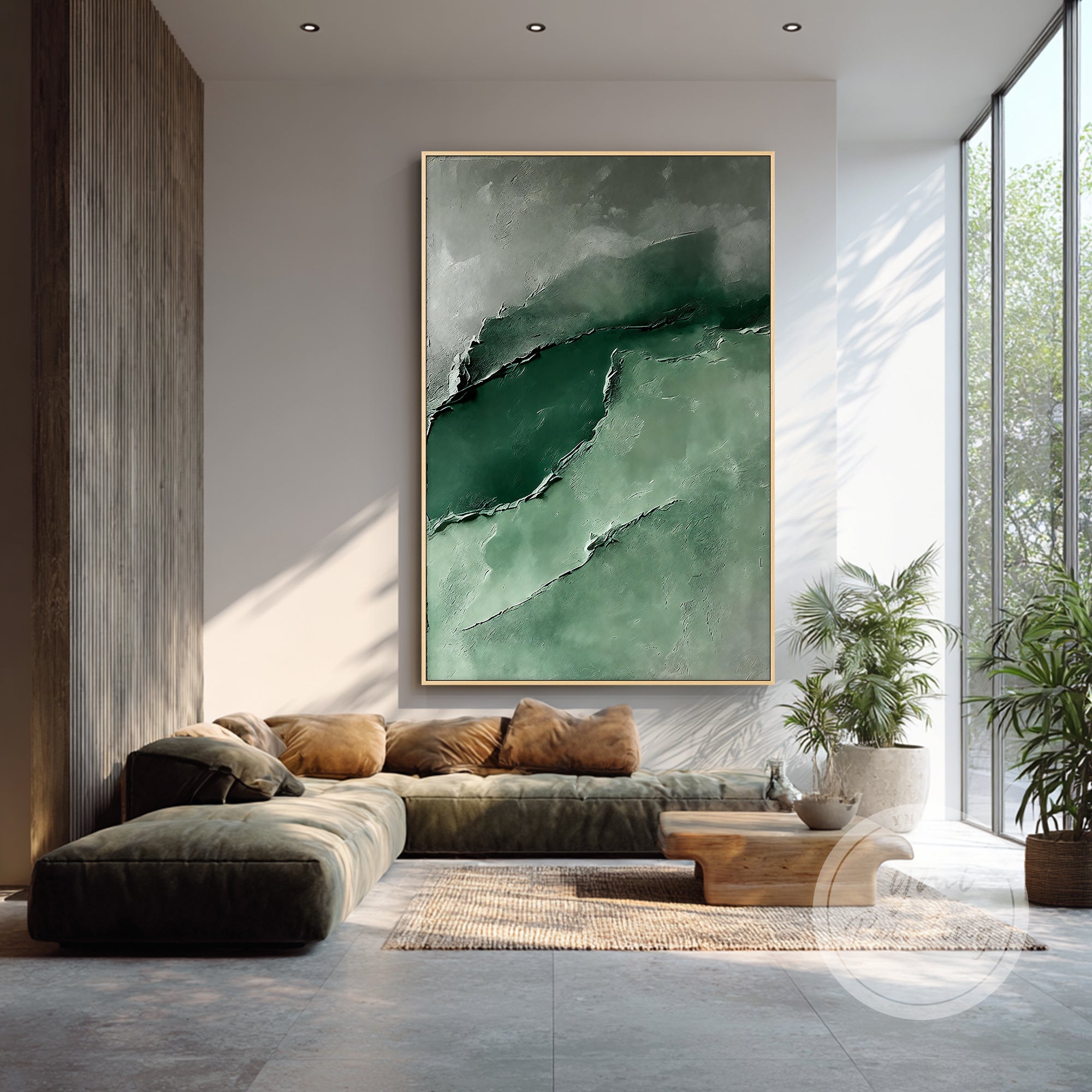 Green relief canvas artwork displayed in a bright living room.