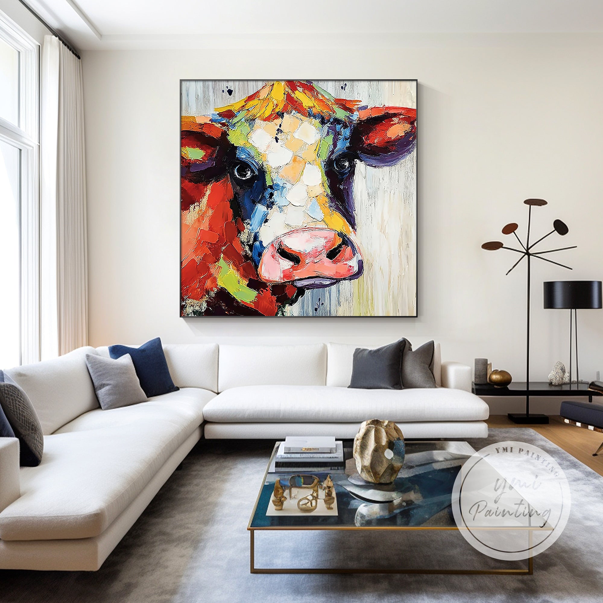 Vibrant cow painting decorating a contemporary living room interior.