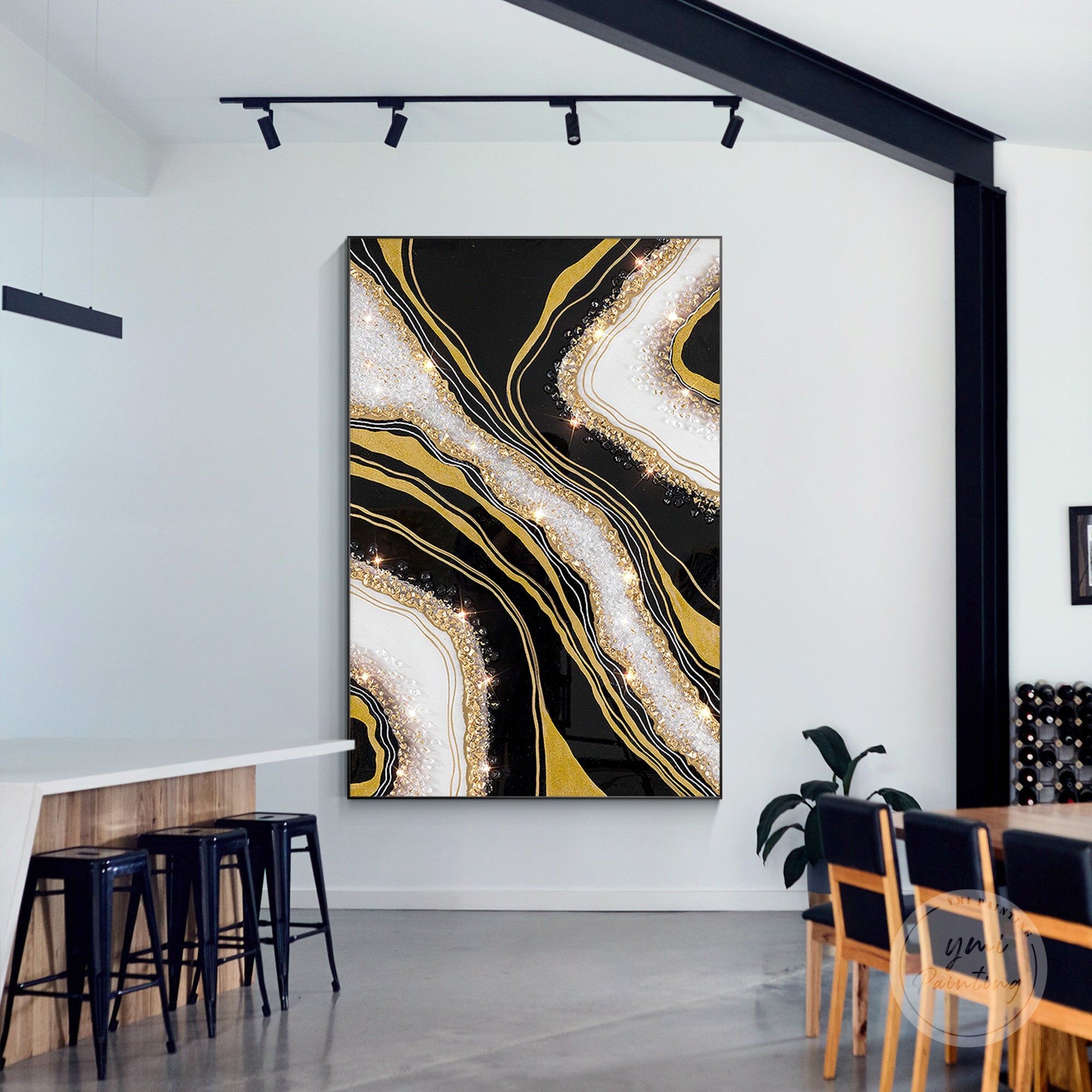 Large black gold geode resin painting for luxury living room statement walls.