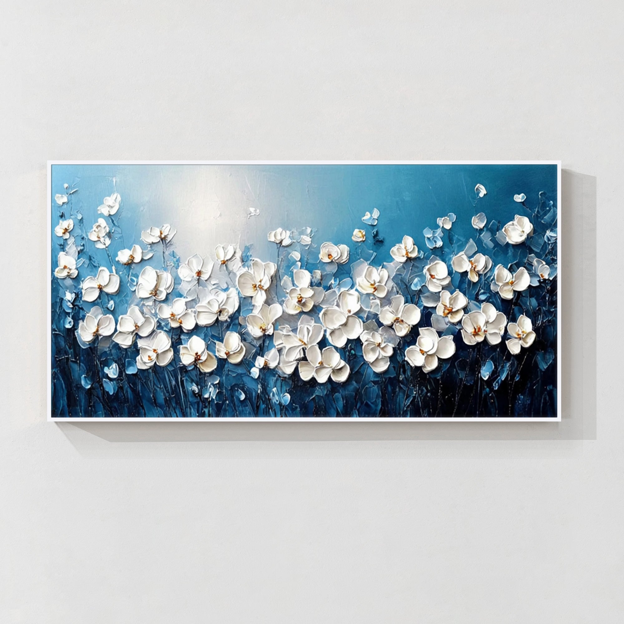 Blue abstract floral wall art with white blossoms