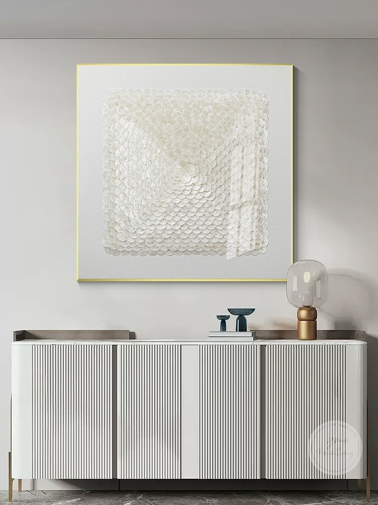 Minimalist white shell décor adding a serene and calming atmosphere to any room.