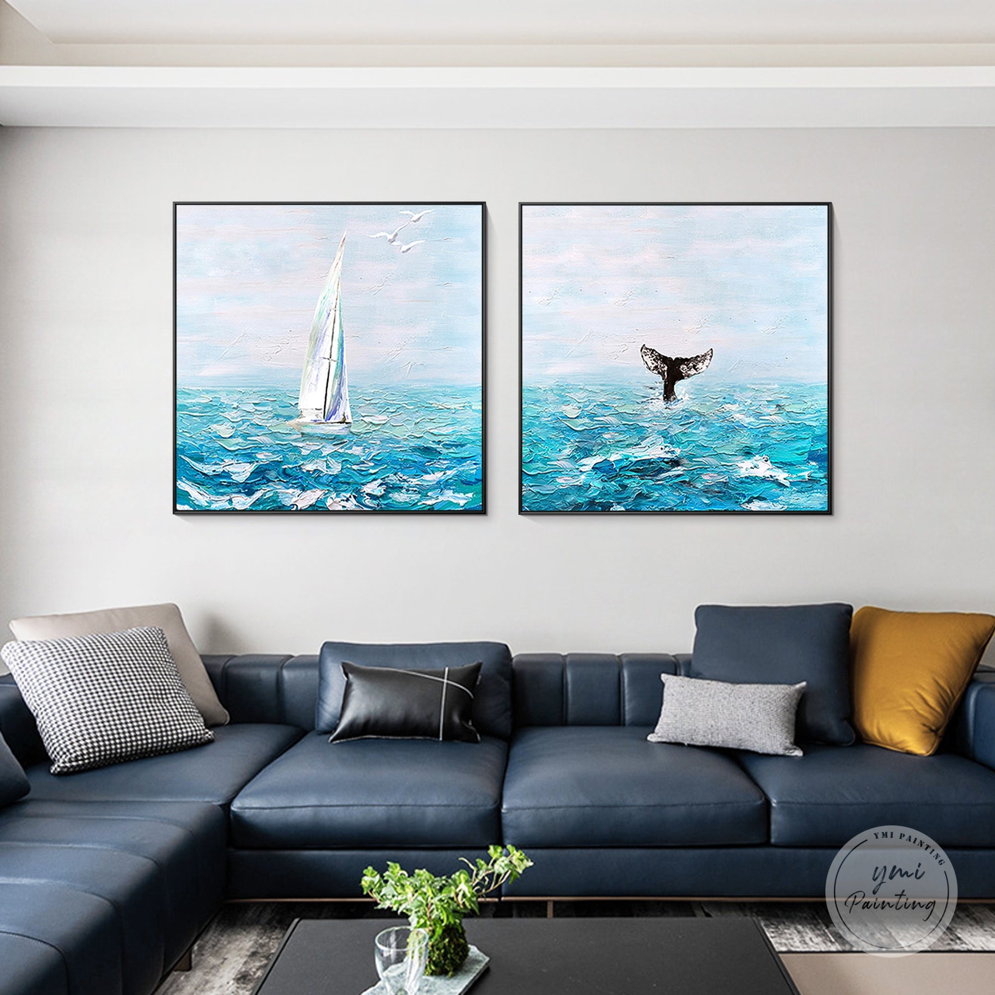 Framed blue seascape canvas painting set displayed in minimalist living room
