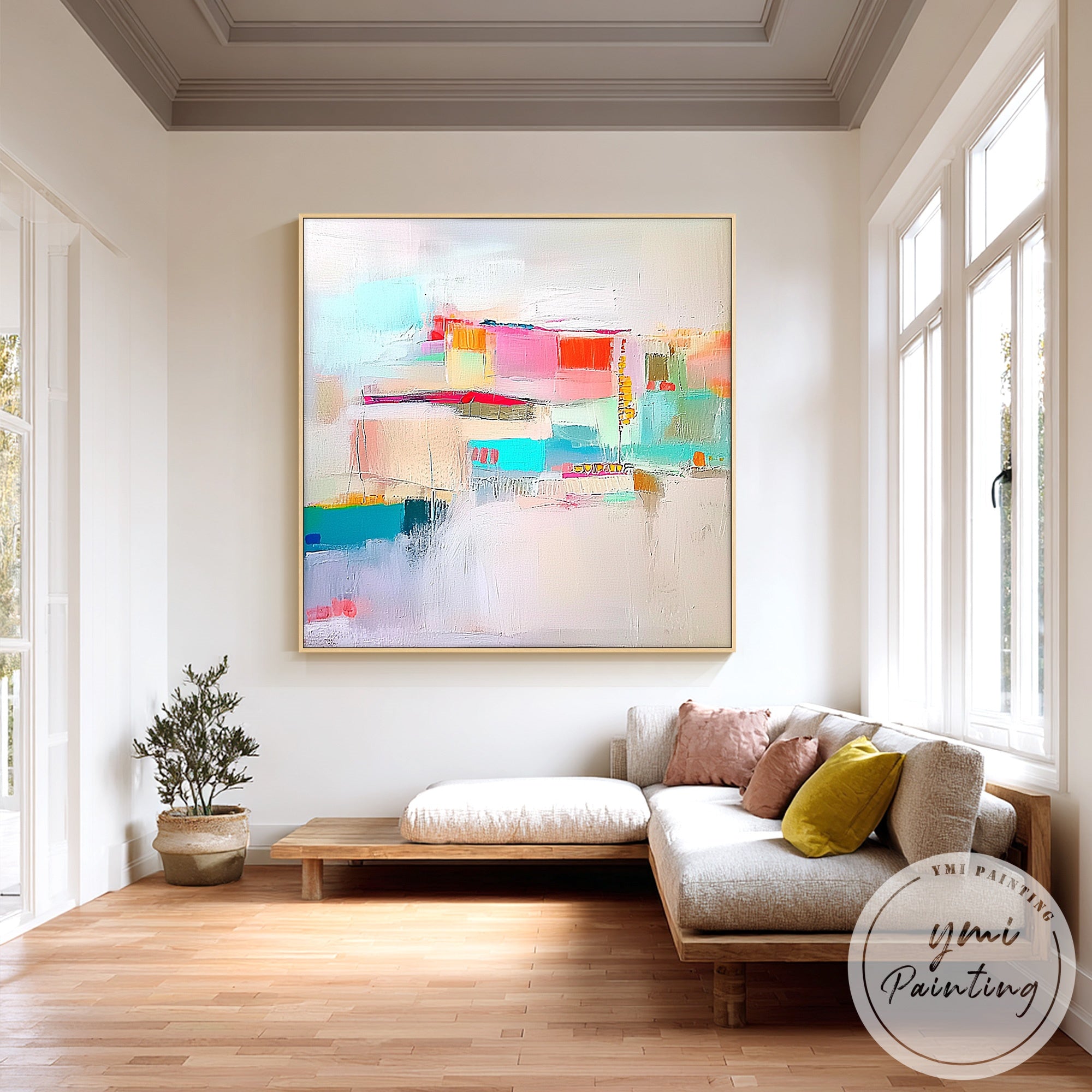 Large contemporary abstract canvas with pink and turquoise tones in bright lounge