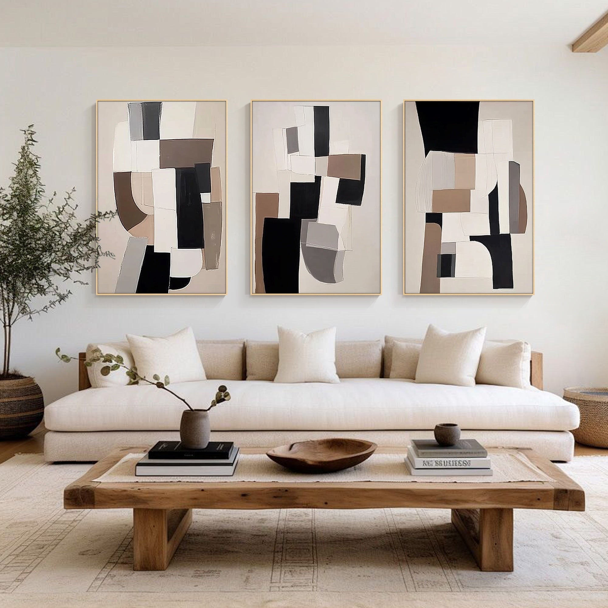 Abstract color block wall print set of three displayed in a modern living room