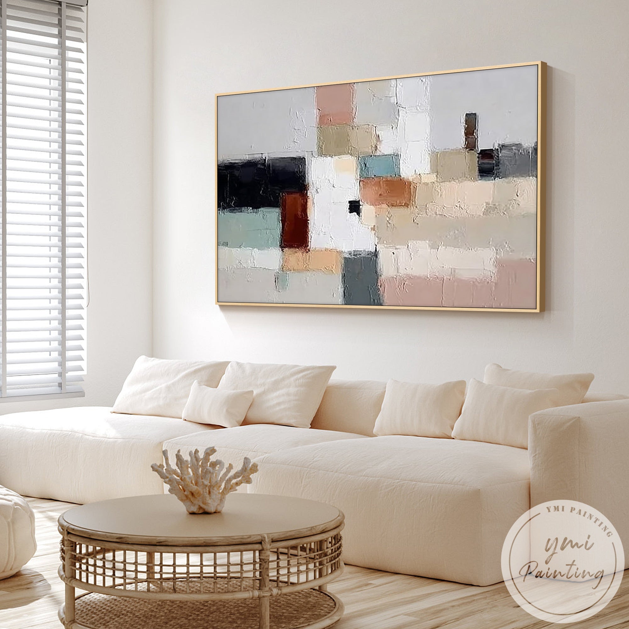 Contemporary geometric wall art with black detail in Japandi living room