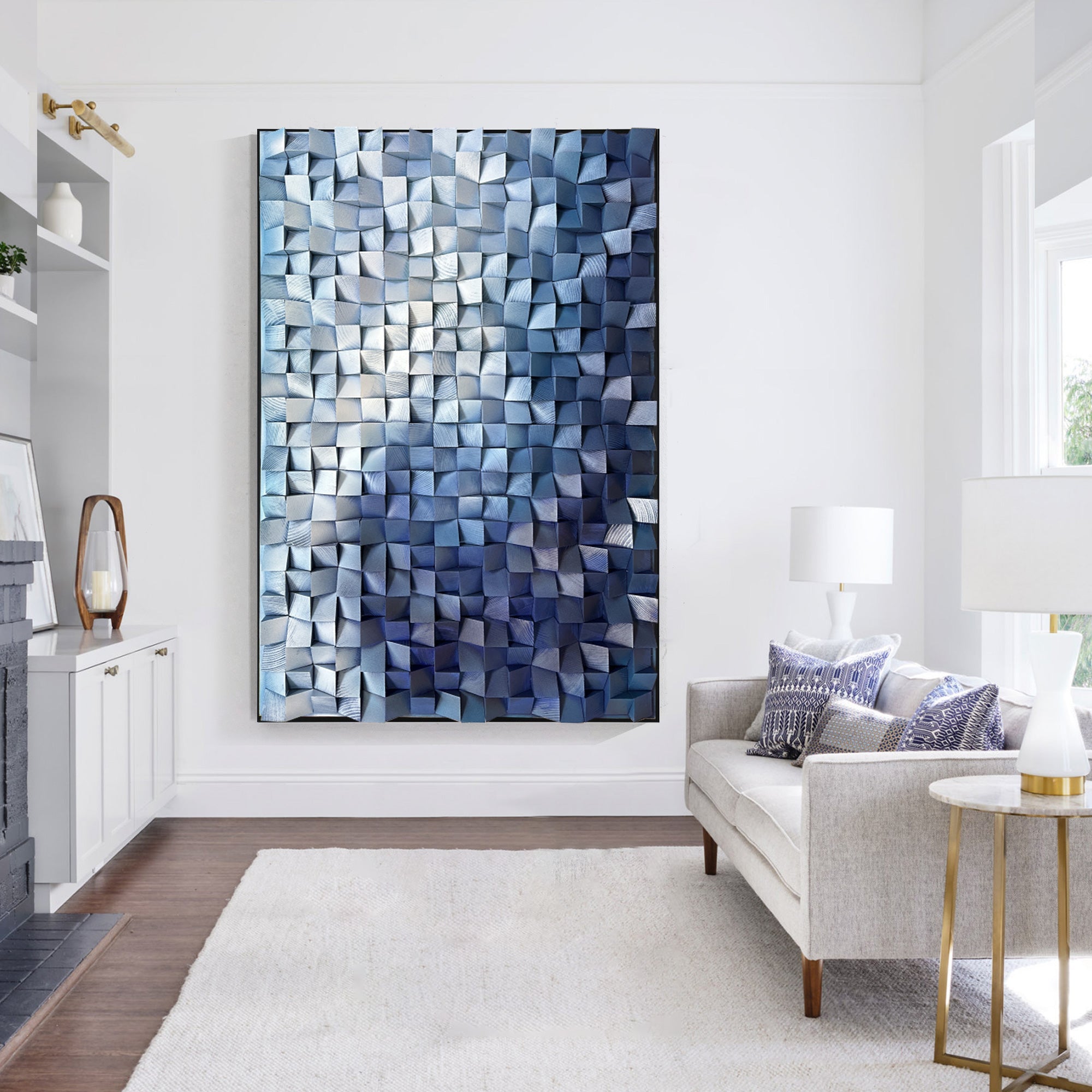 Three-dimensional art piece with blocks in gradient blue wood, emphasizing structure, depth, and contemporary style.