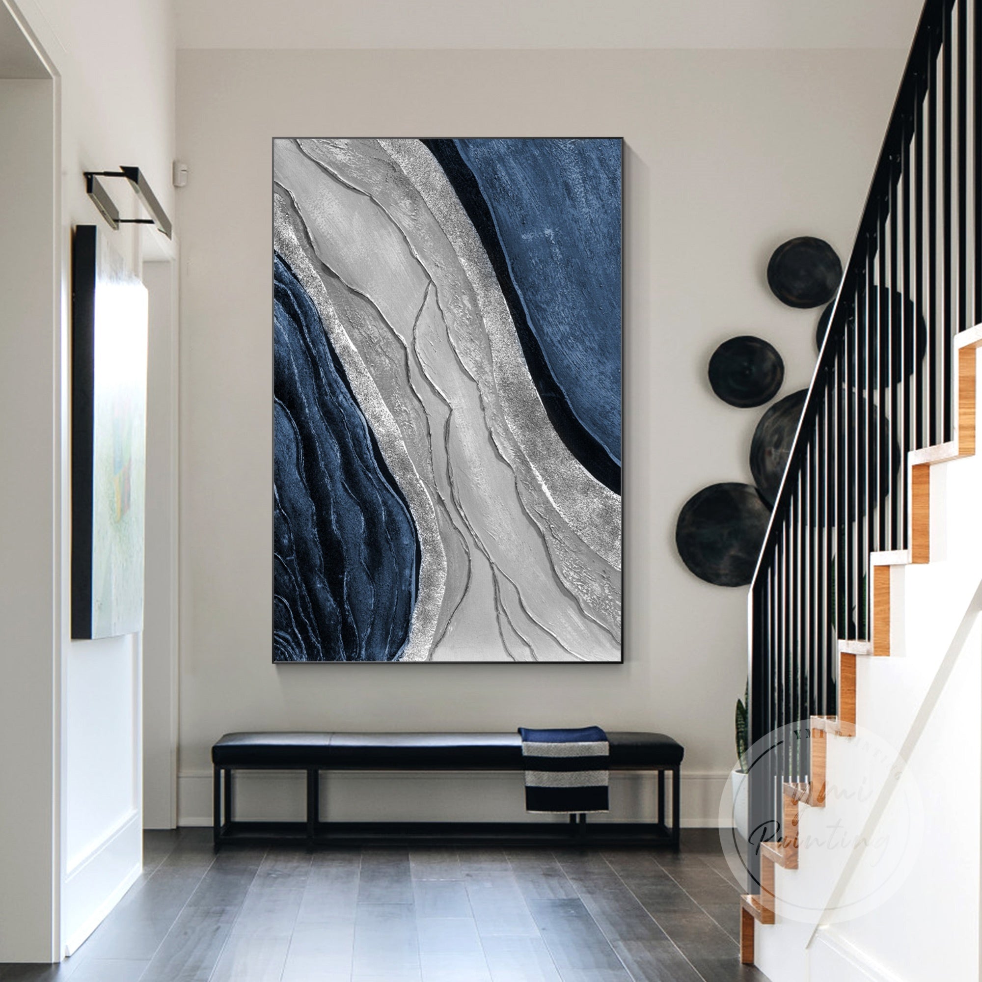 Bold silver and gray layered artwork on canvas