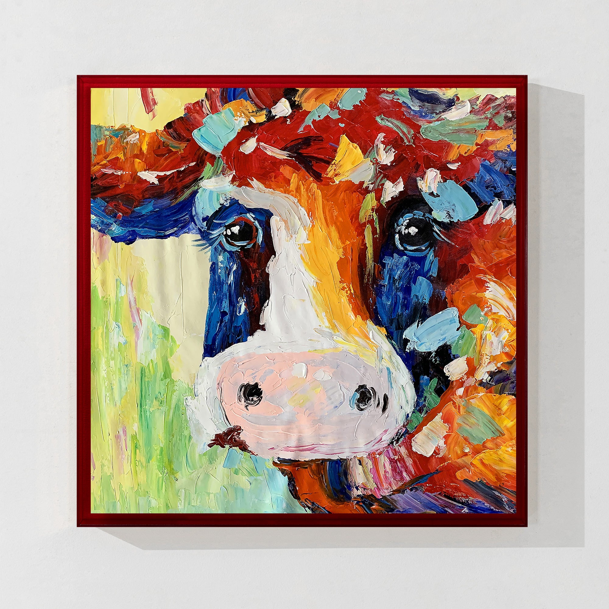 Modern cow wall art displayed in a floating canvas frame, perfect for contemporary home decor.