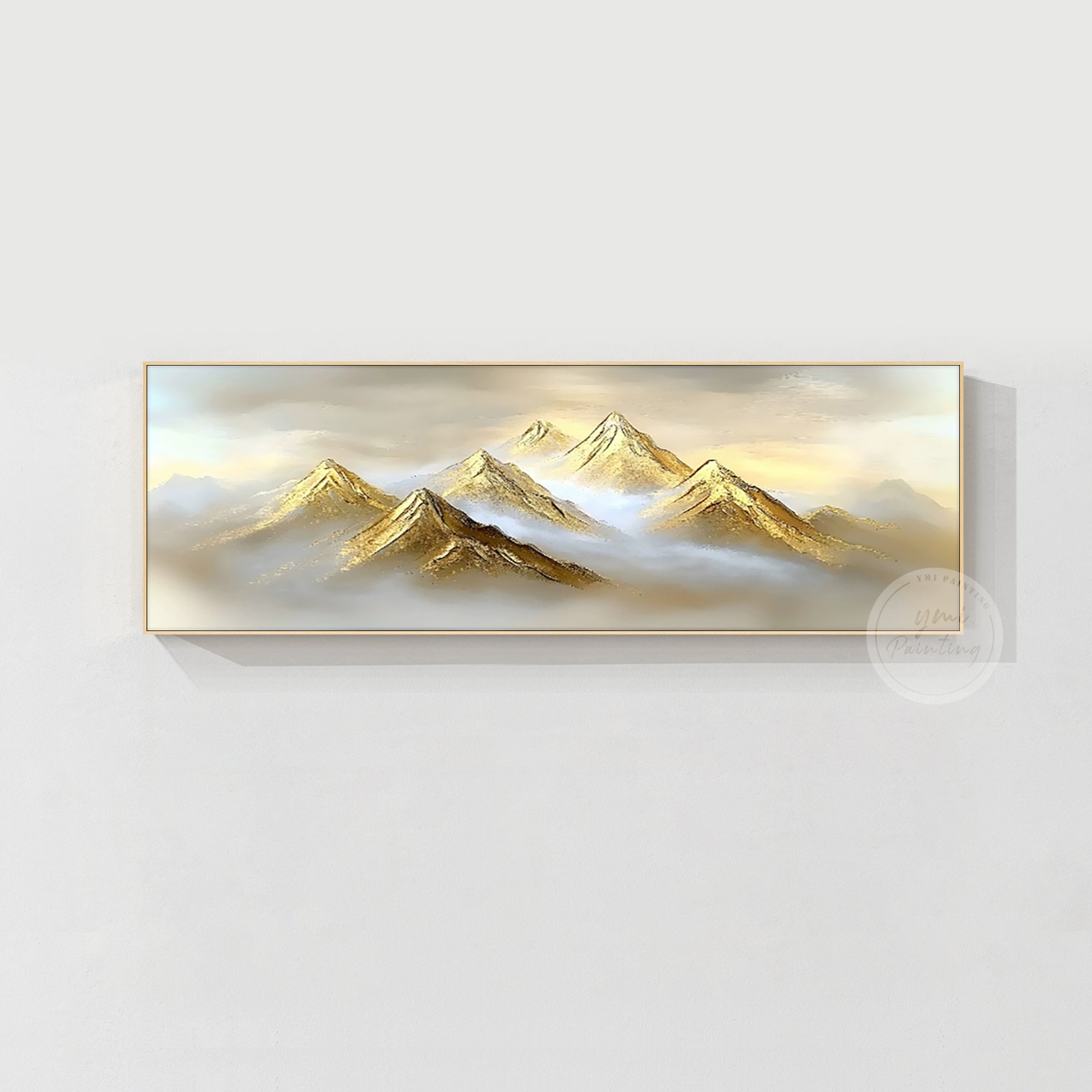 Luxury gold mountain wall art above a console table in a modern hallway, sophisticated new home gift