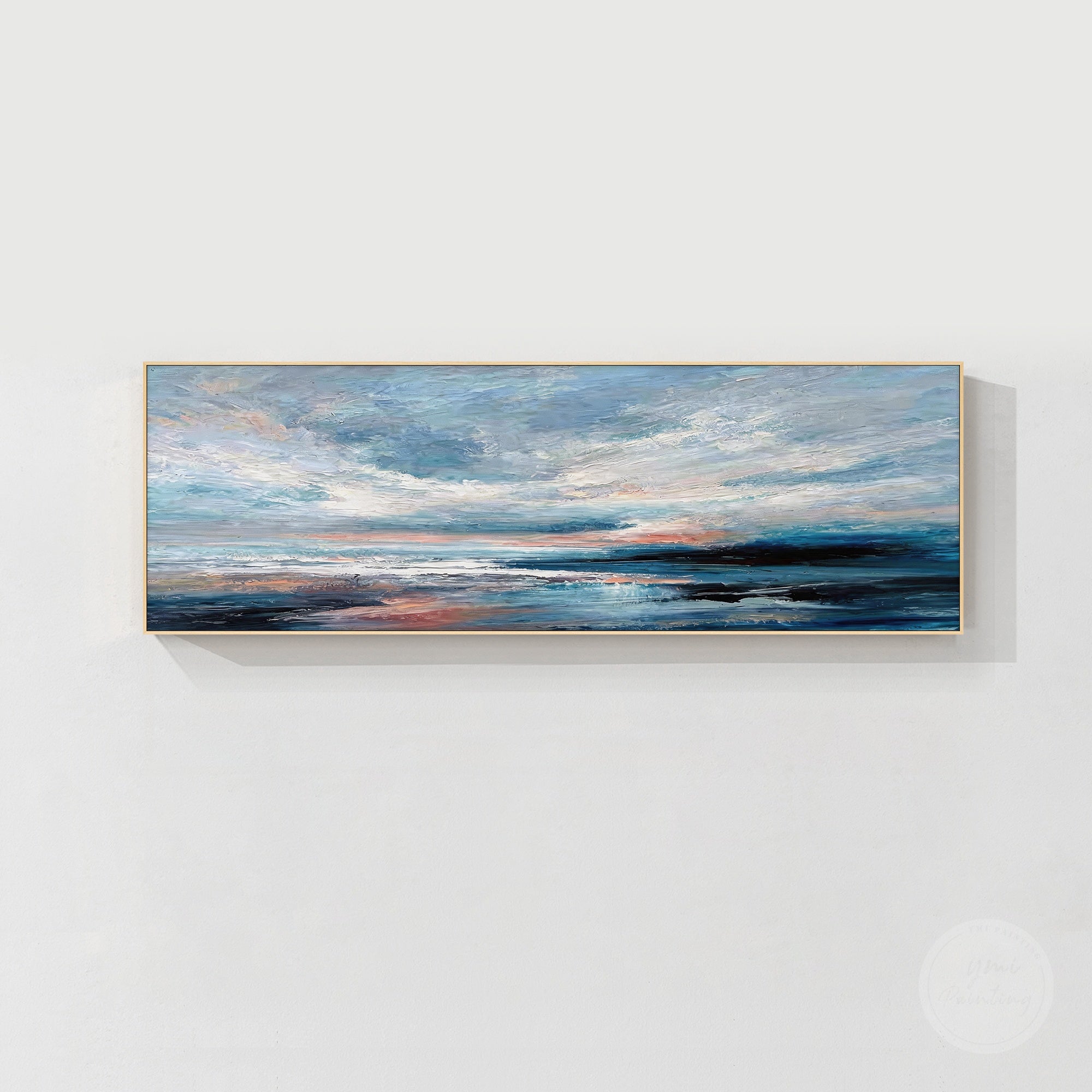 Textured ocean painting in blue white gray and subtle peach tones