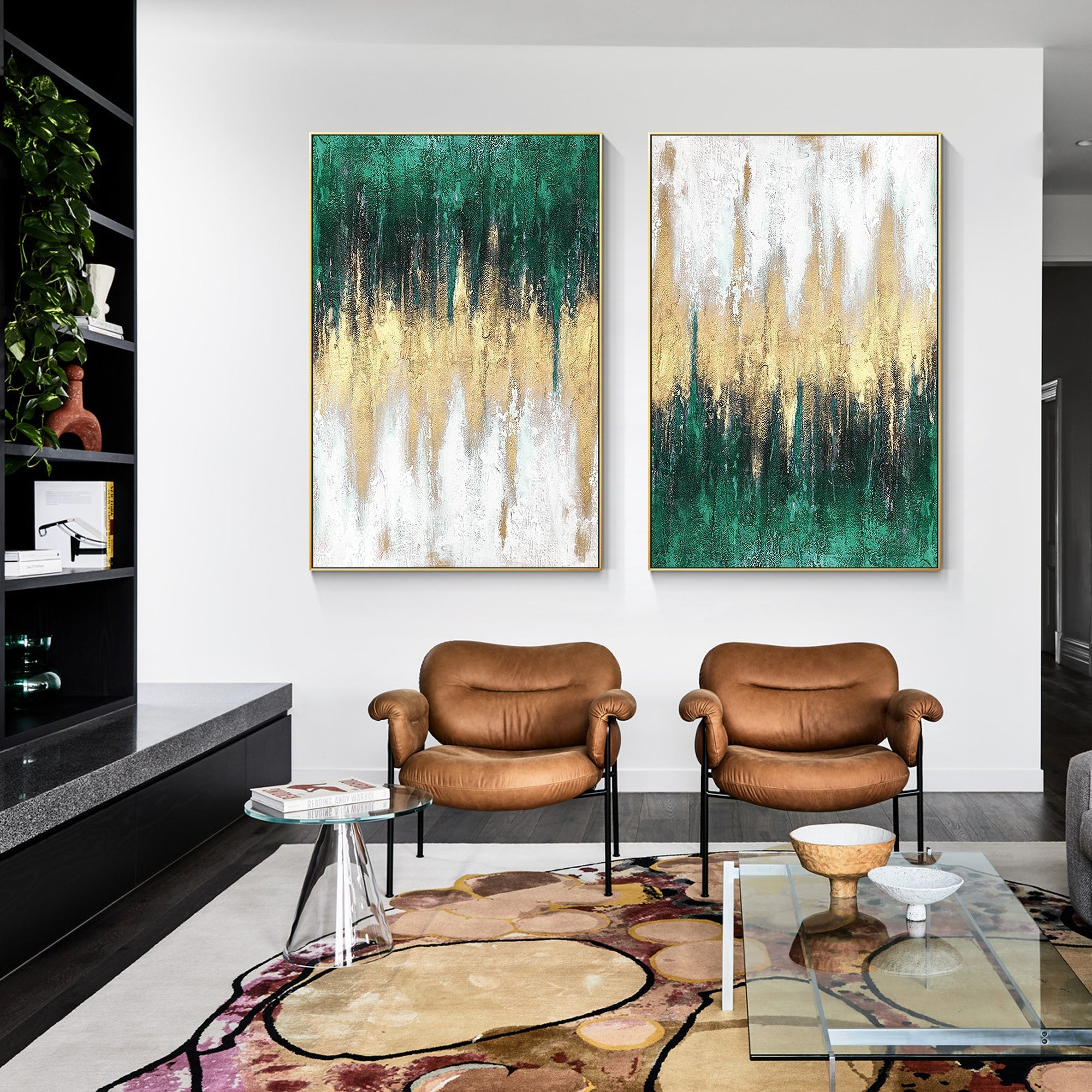 Hand-painted green gold white abstract canvas set of 2 in a minimalist living room