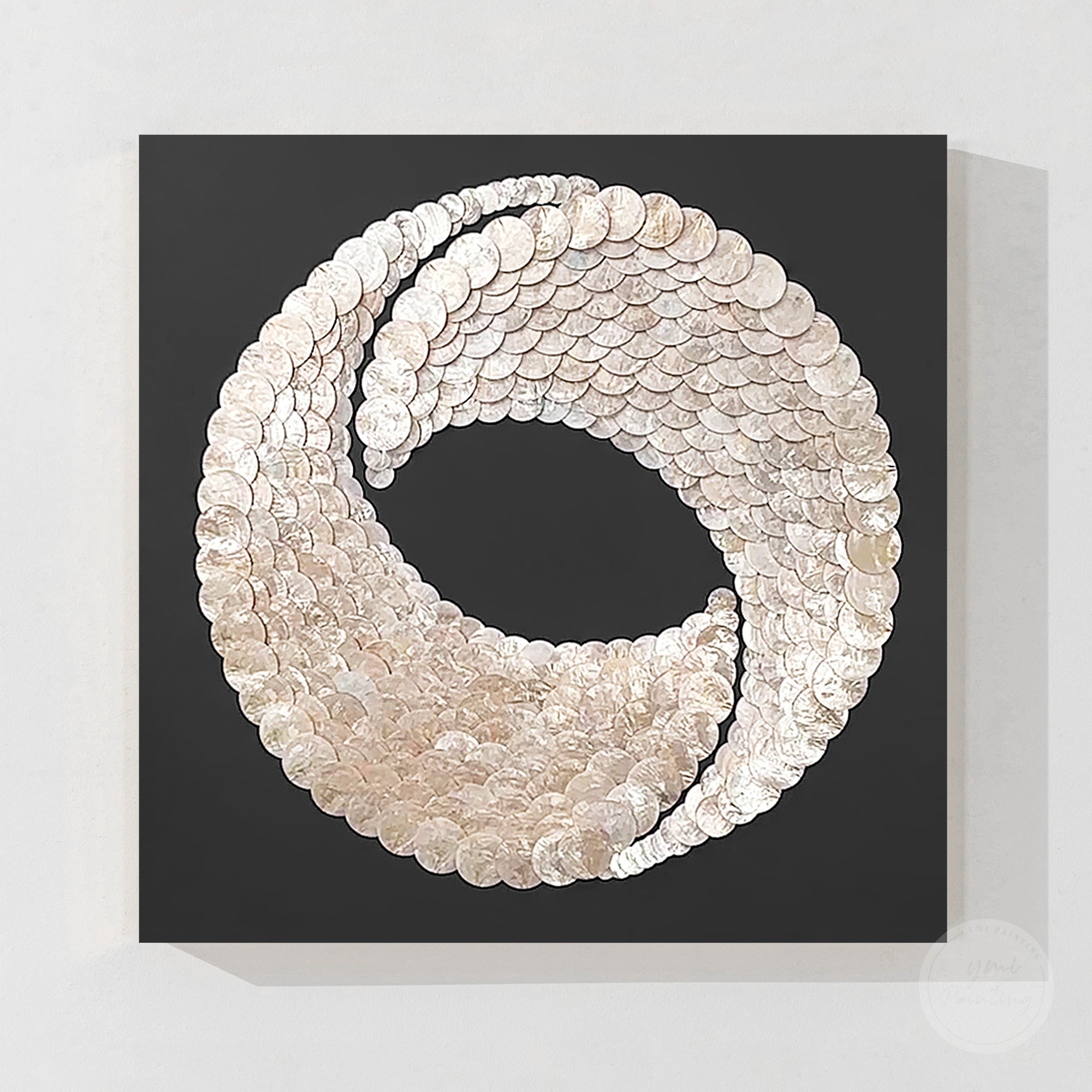 White seashell circle artwork on black background for home decor