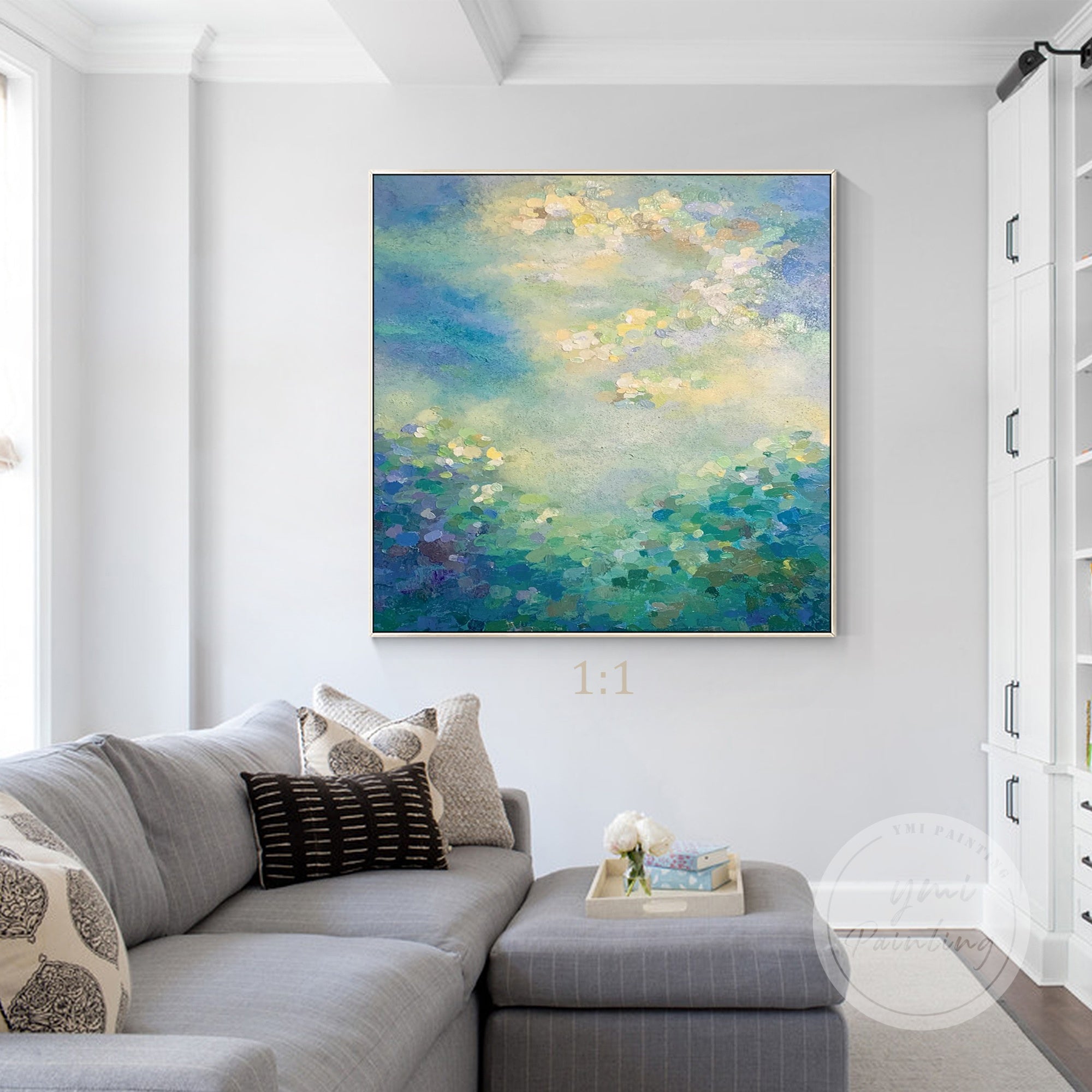 Oil painting of water lilies in soft blues and greens with golden accents