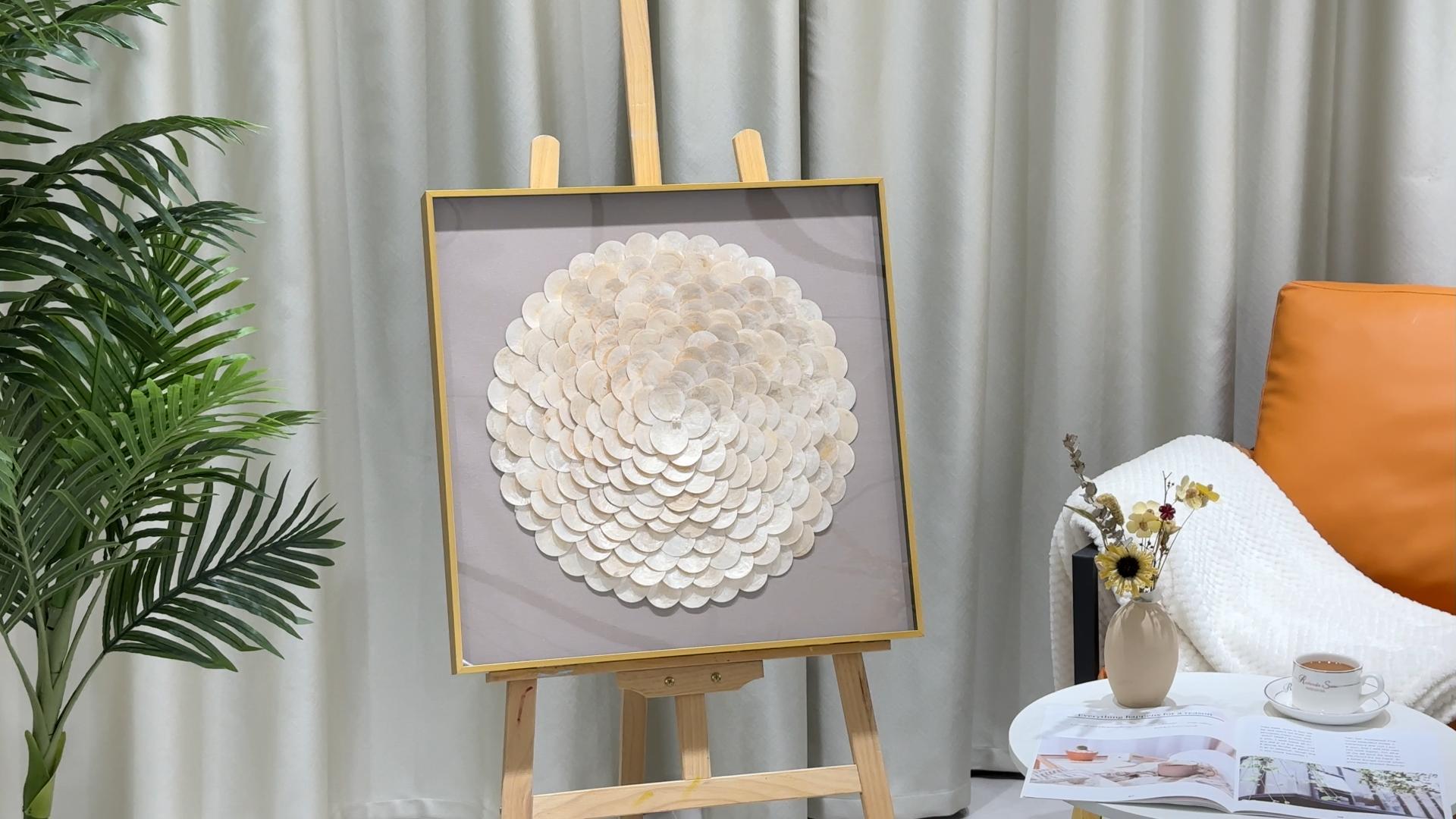 Sophisticated seashell canvas with soft textures and light colors, creating a serene and upscale artistic statement.