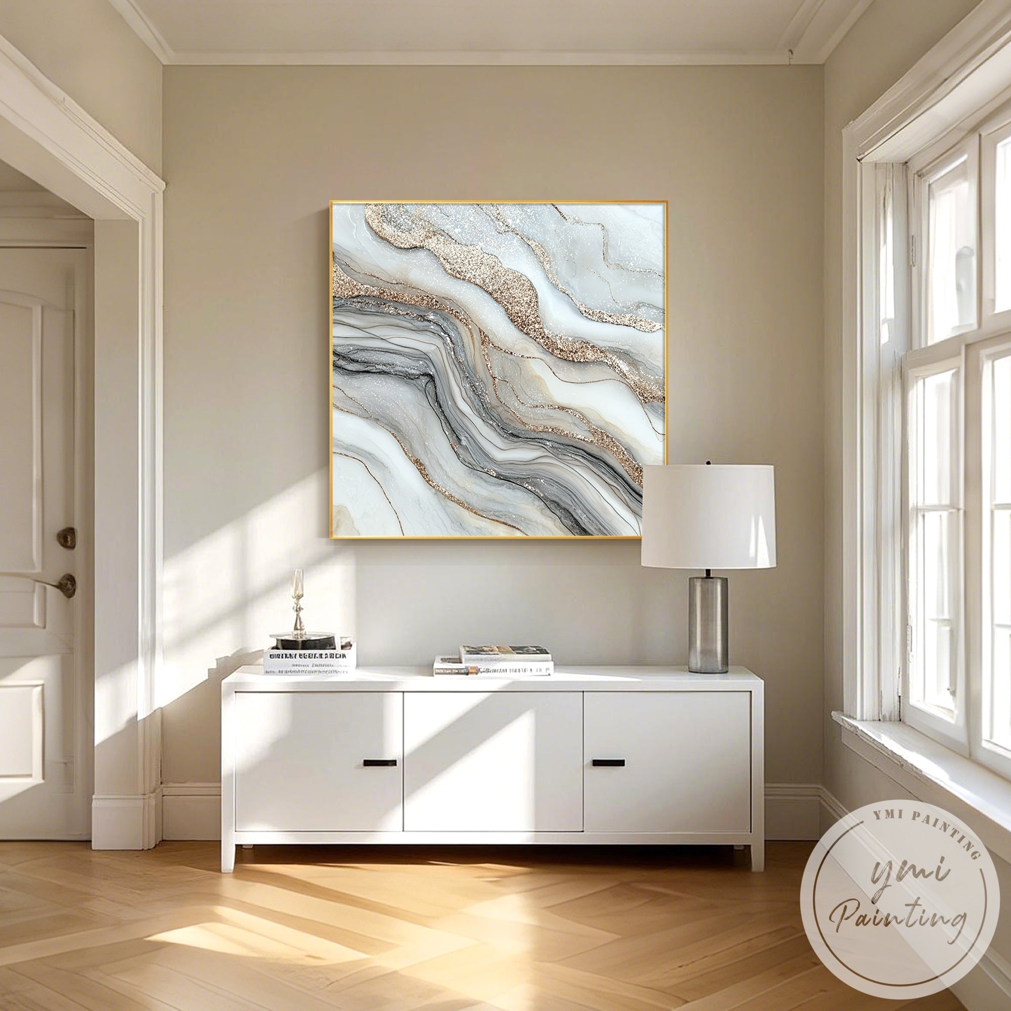 Neutral luxury wall art in bright airy living room with natural sunlight