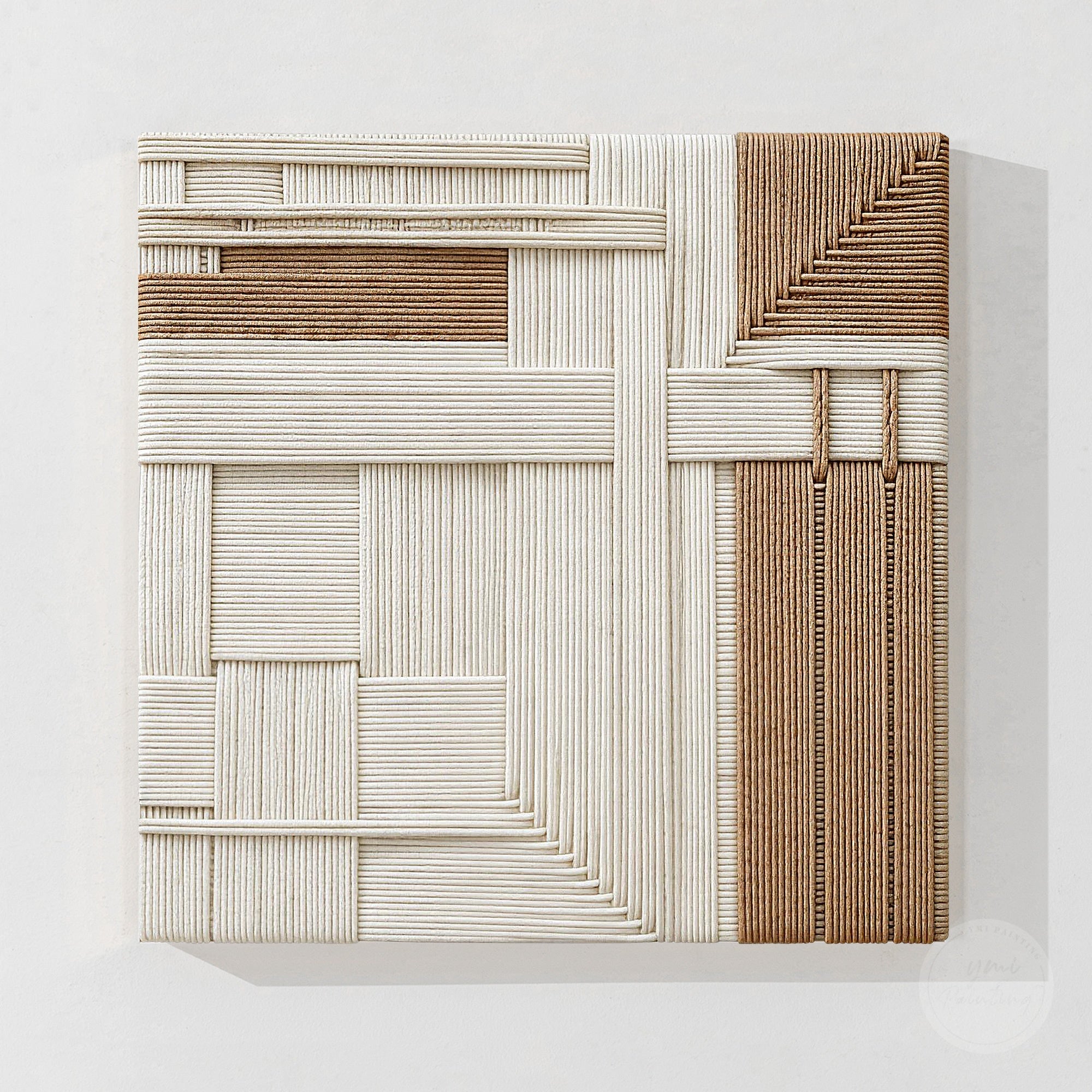 Modern woven fiber artwork in ivory and brown tones