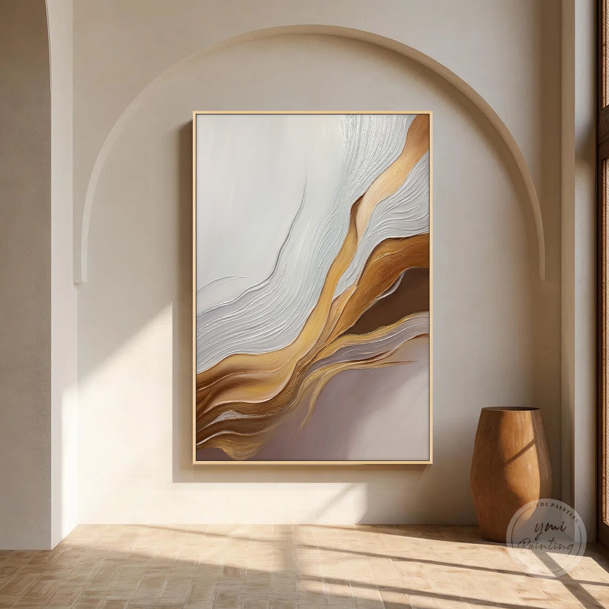 Textured abstract painting with gold accents hanging above a minimalist sofa, refined housewarming gift