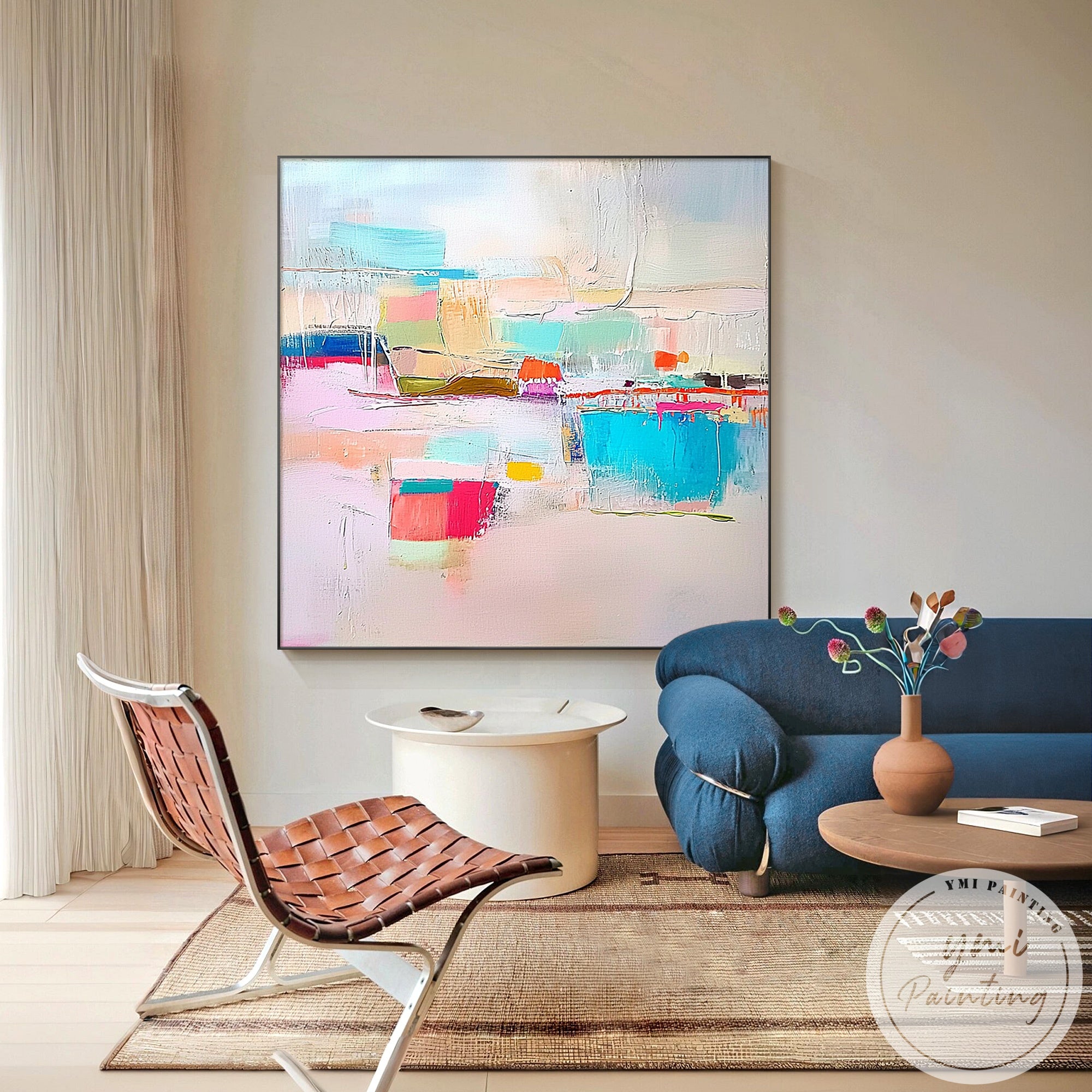 Large minimalist beige canvas painting above cream sofa