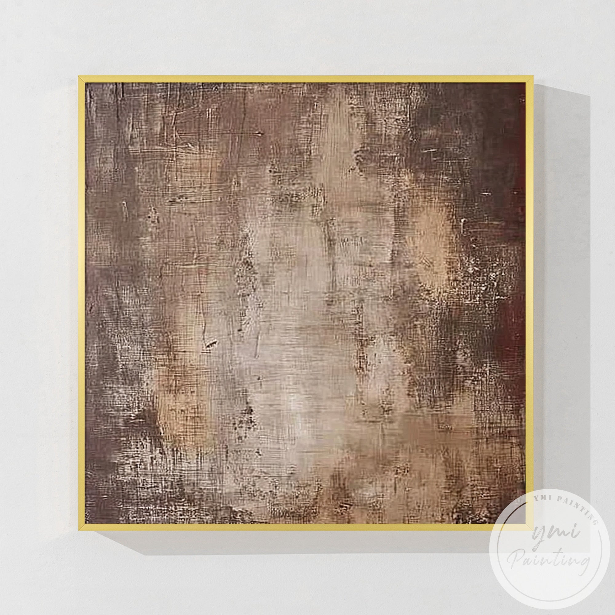 Abstract brown textured canvas wall art displayed above modern neutral living room sofa