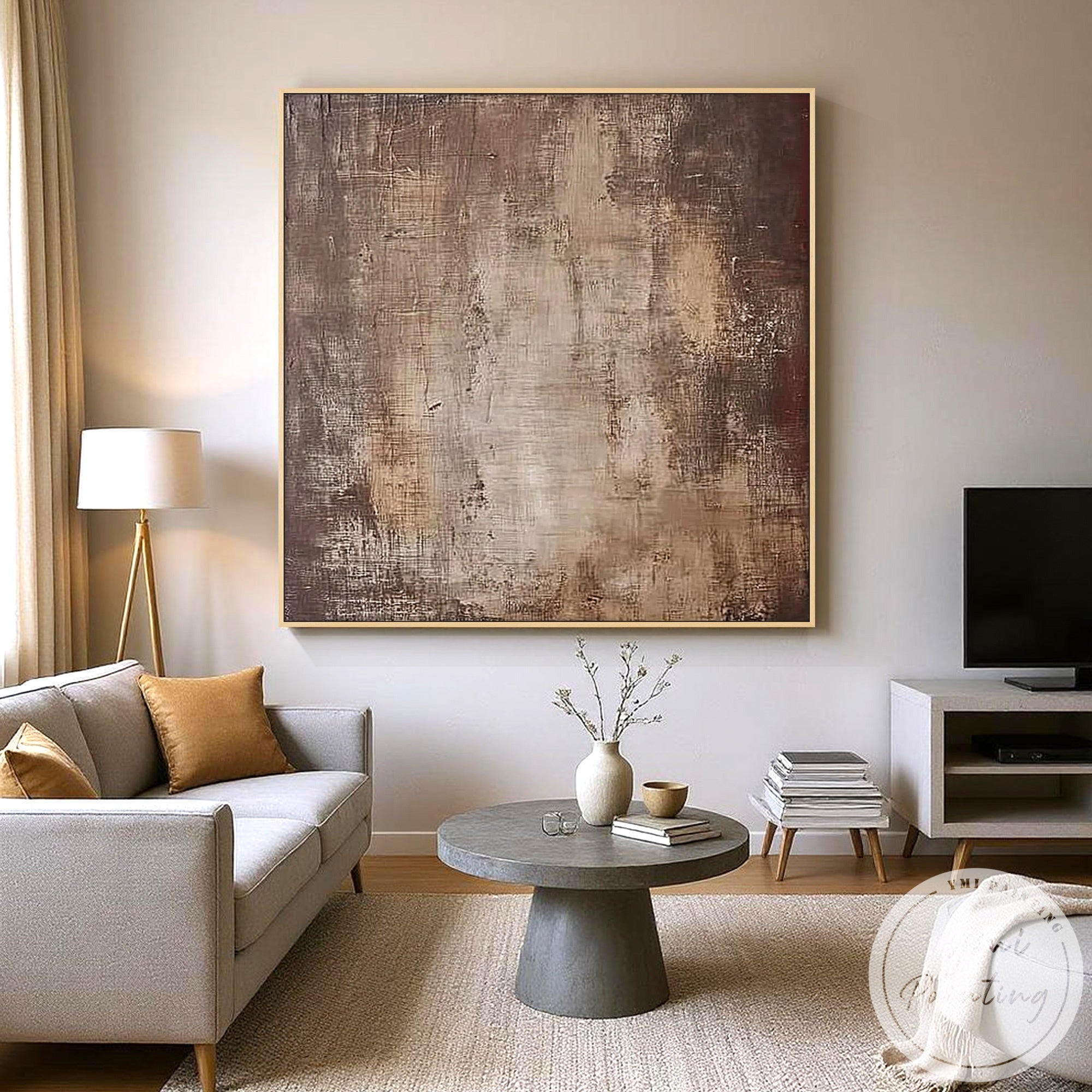Large beige and brown textured wall art above sectional sofa in contemporary home decor
