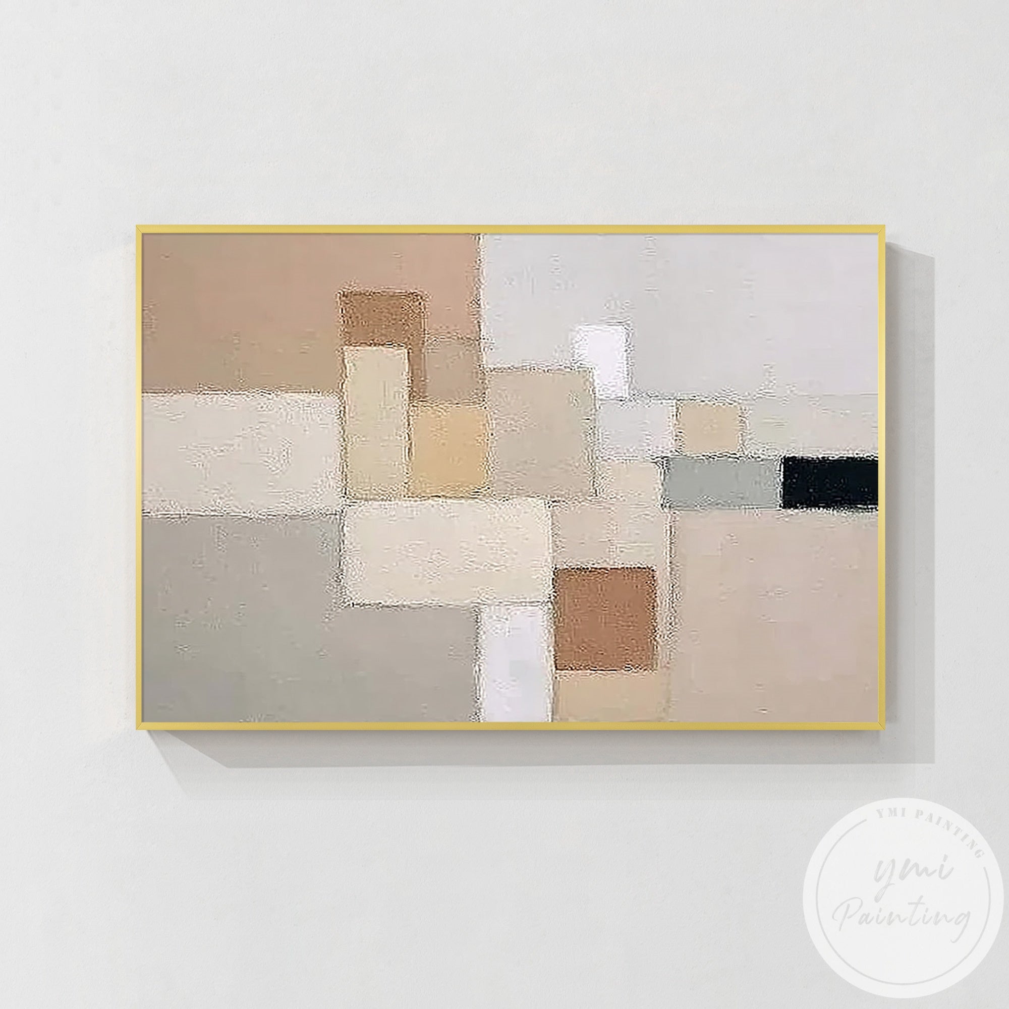 Neutral geometric abstract wall art above beige sofa in modern living room