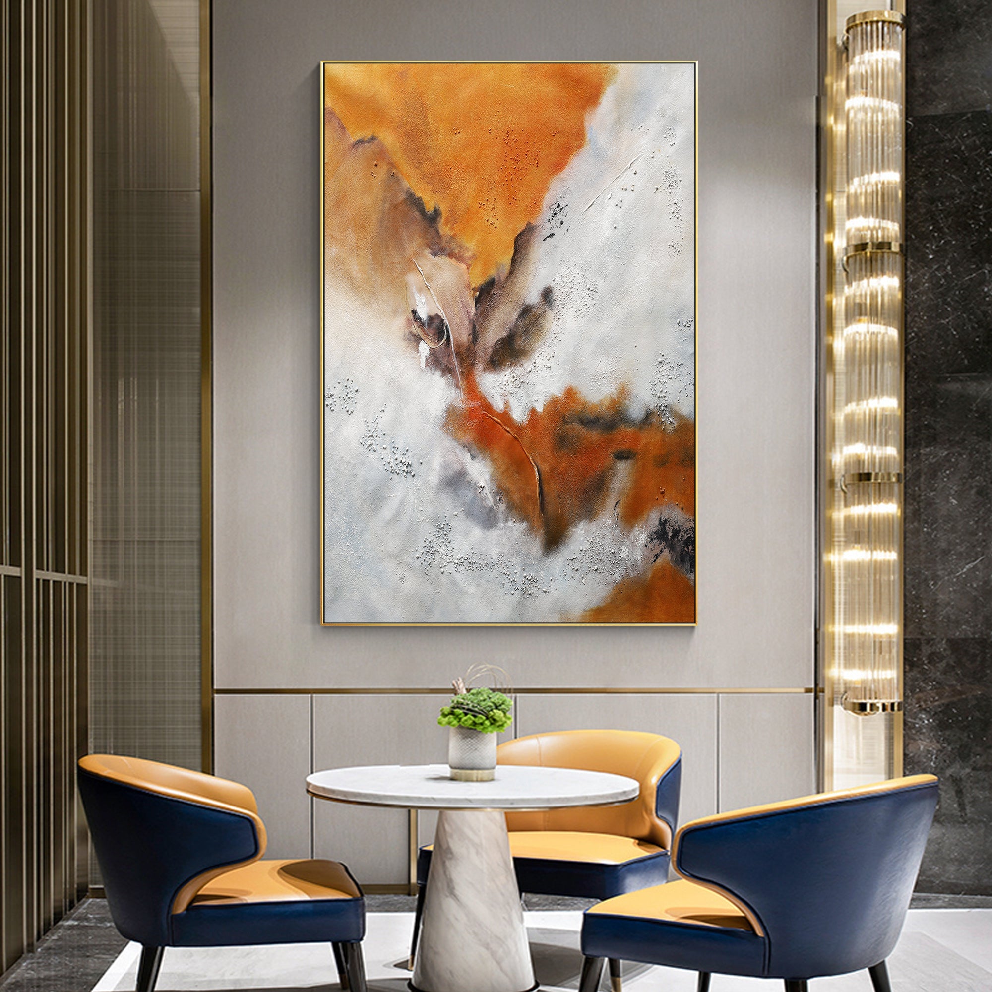 Orange white and brown abstract wall art displayed in a modern living room