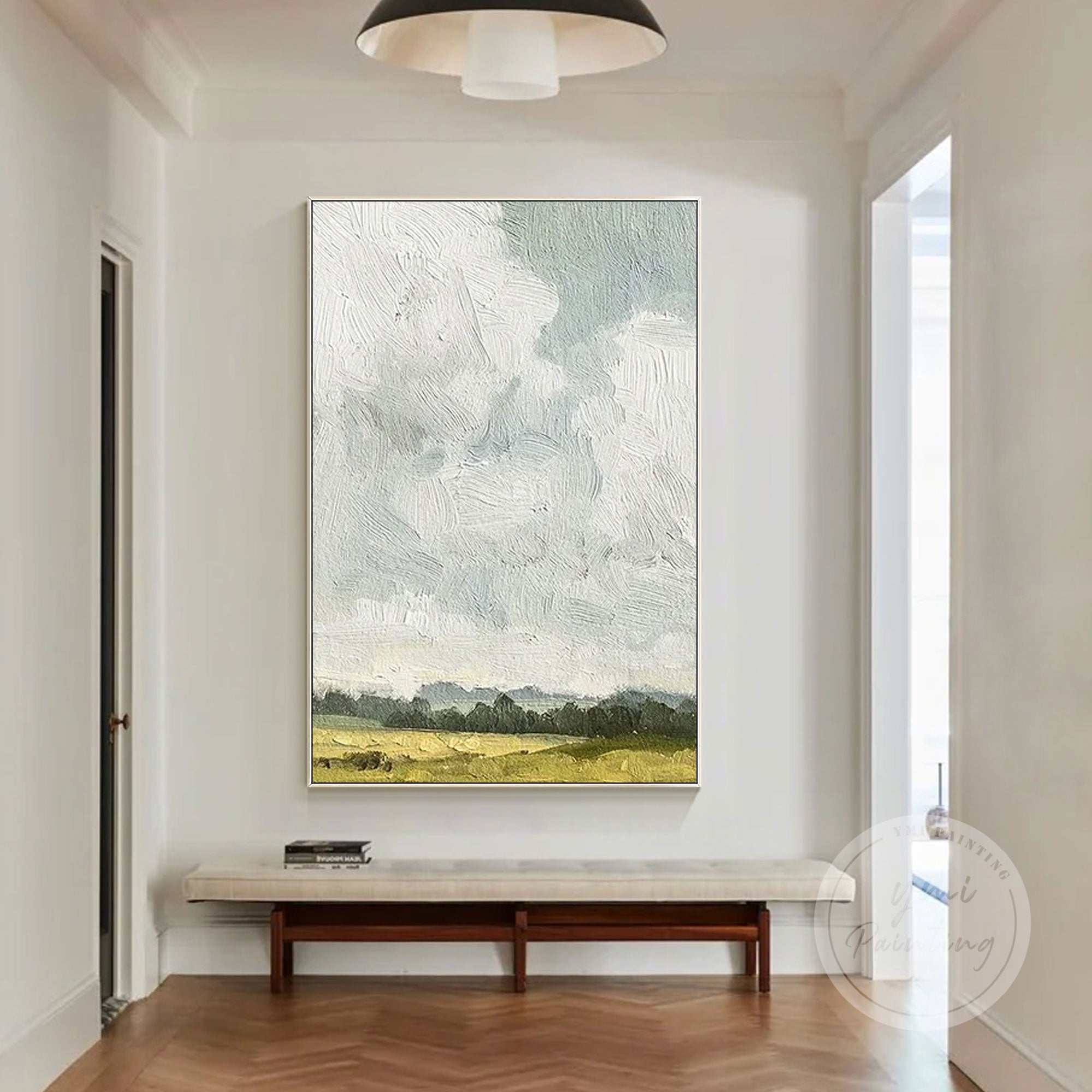 Peaceful minimalist painting of an open field under cloudy sky.