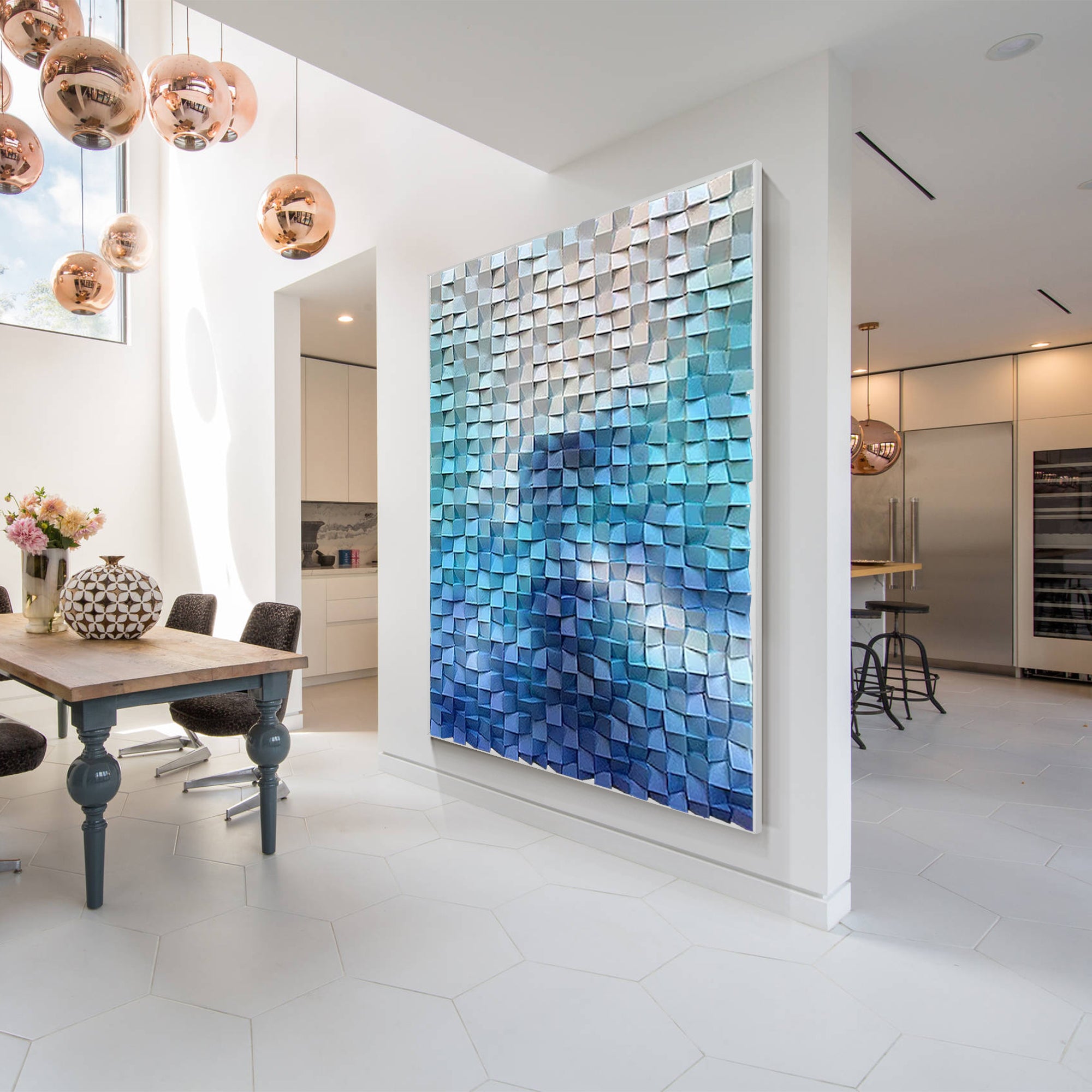 Modern mosaic wall art composed of abstract wood square tiles in blue and white, creating a striking visual statement in a open living room.