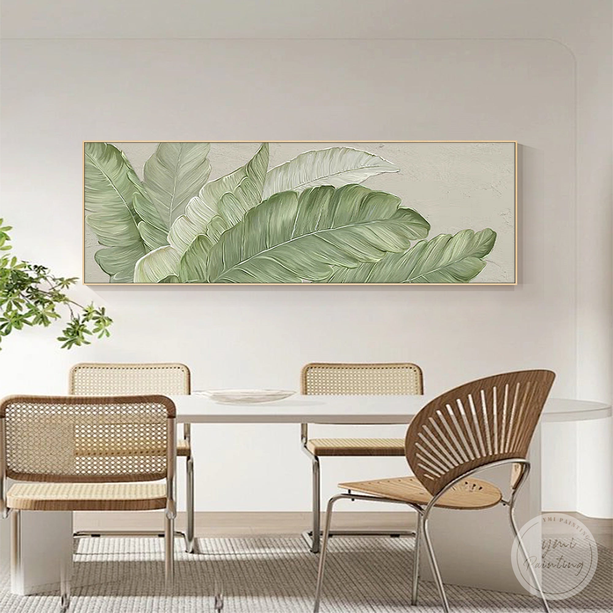 Minimalist botanical wall decor featured in a home dining room