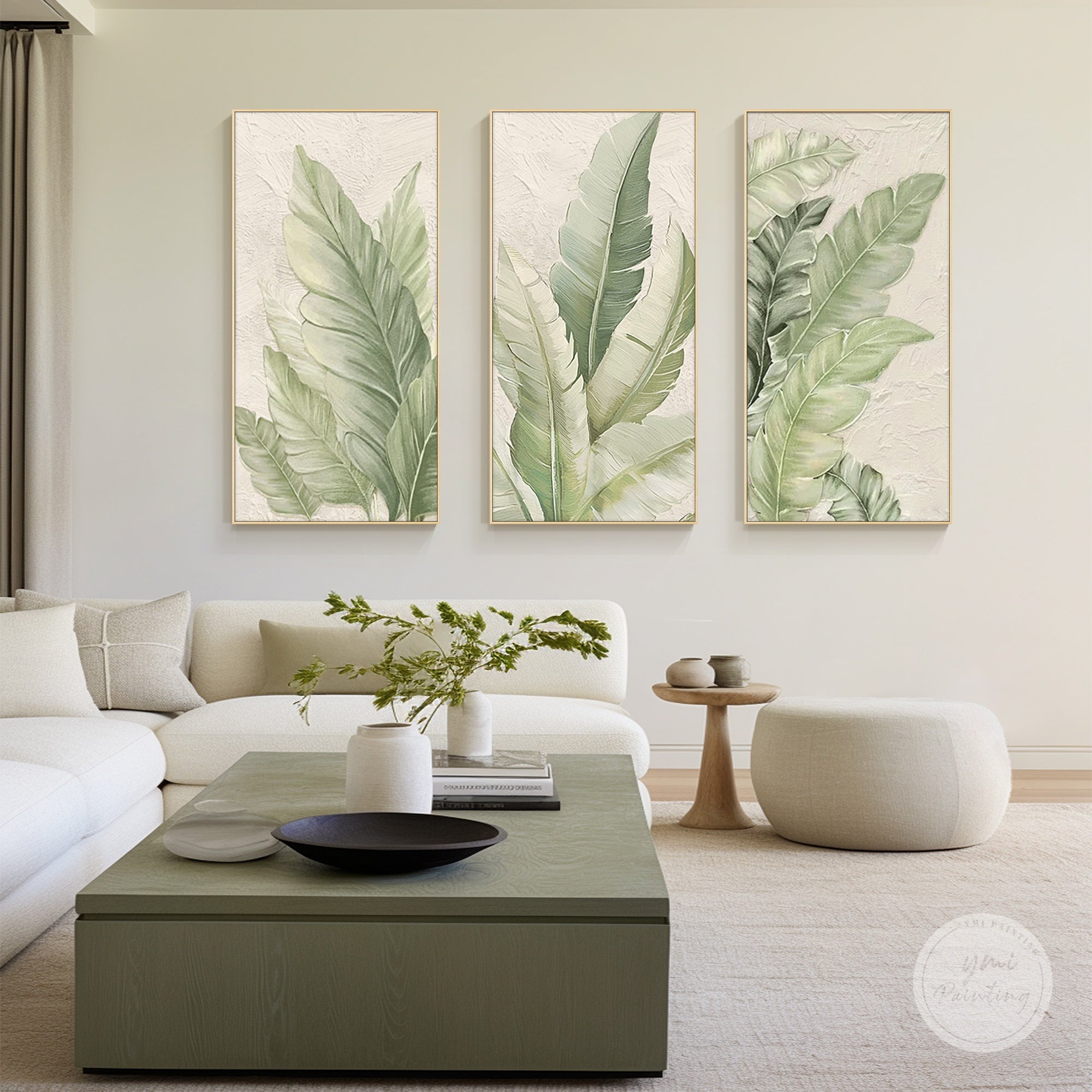 Tropical greenery wall art set above a living room sideboard
