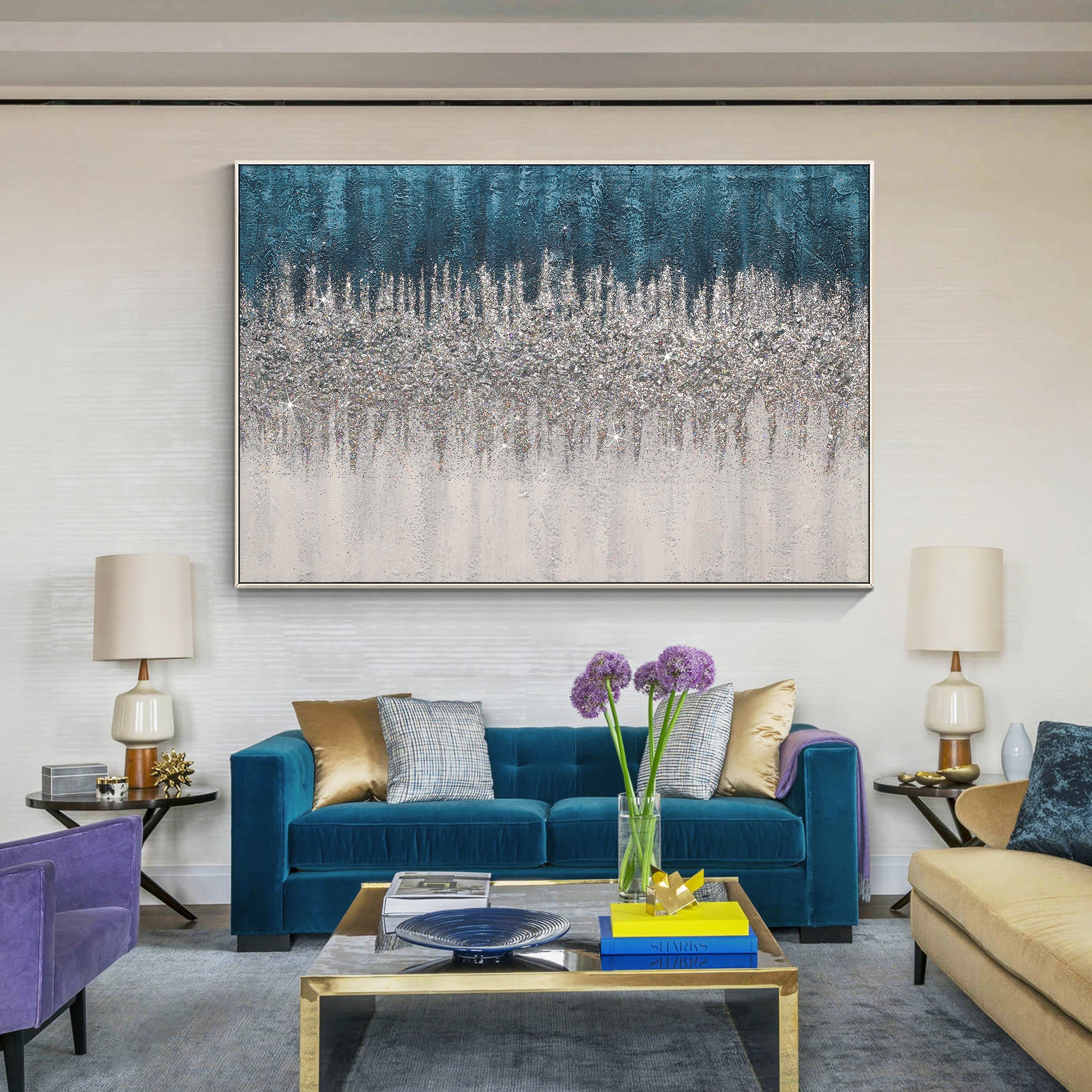 Turquoise abstract canvas wall art with glitter details above a sofa in matching blue tones