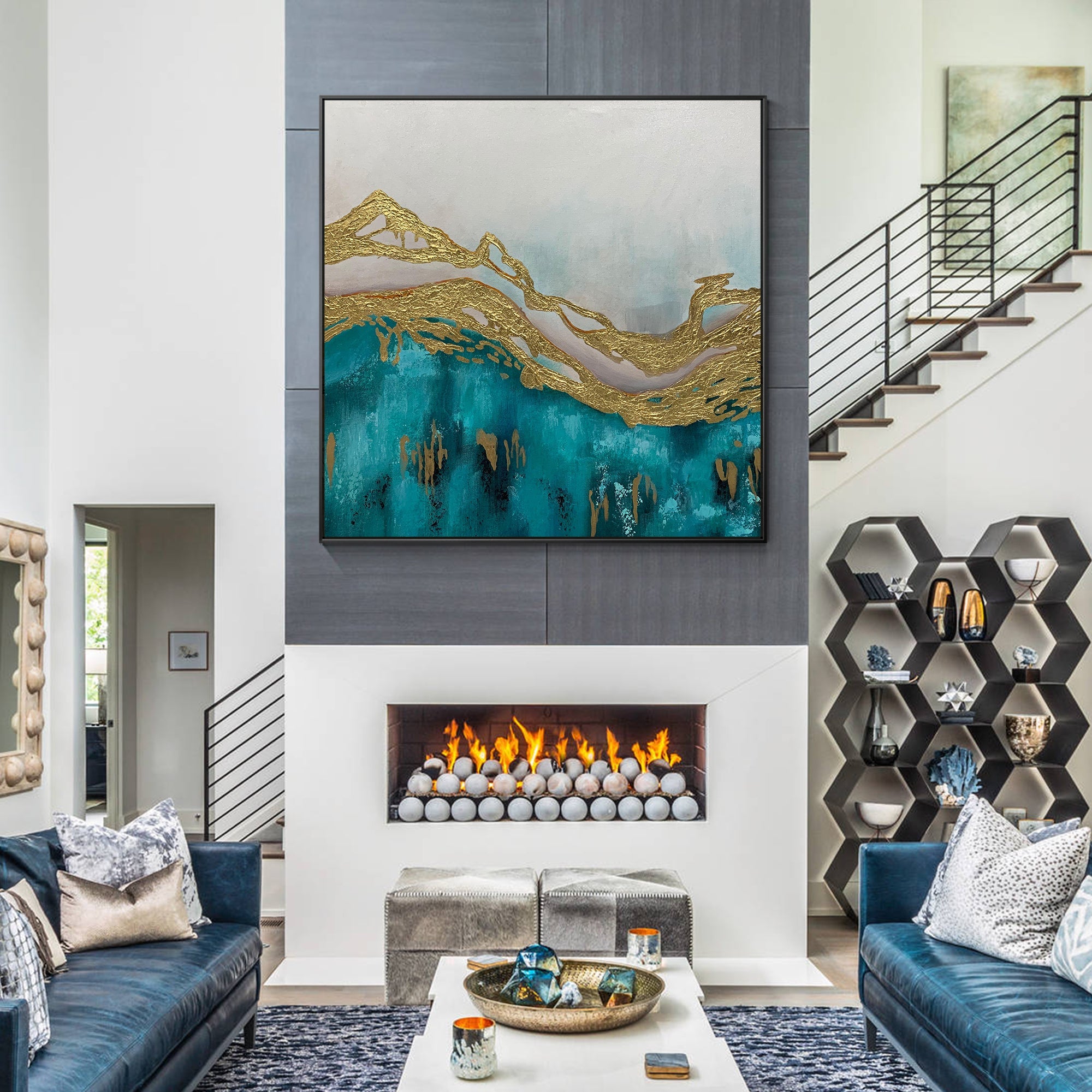 Abstract turquoise and gold mountain canvas wall art in a modern living room