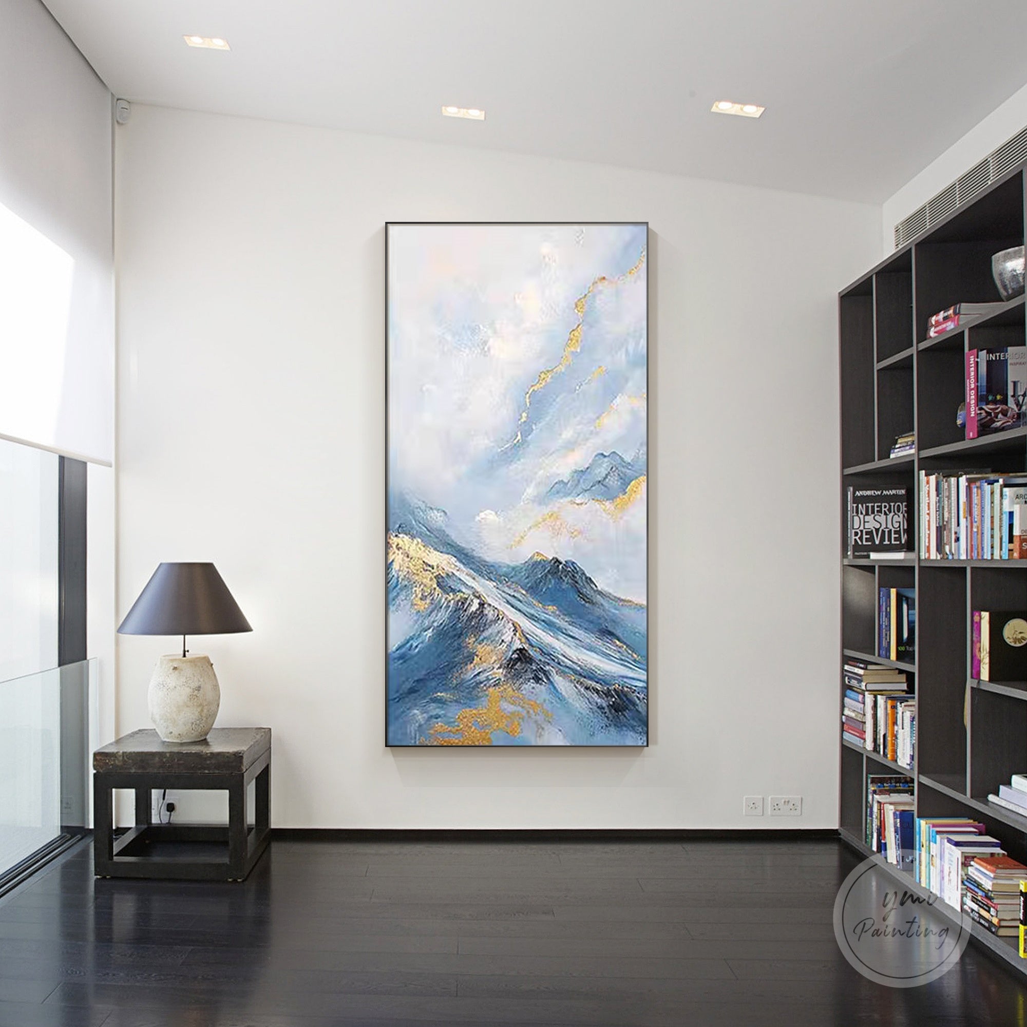 
Vertical abstract mountain painting above a console table in a modern hallway, tasteful new home gift
