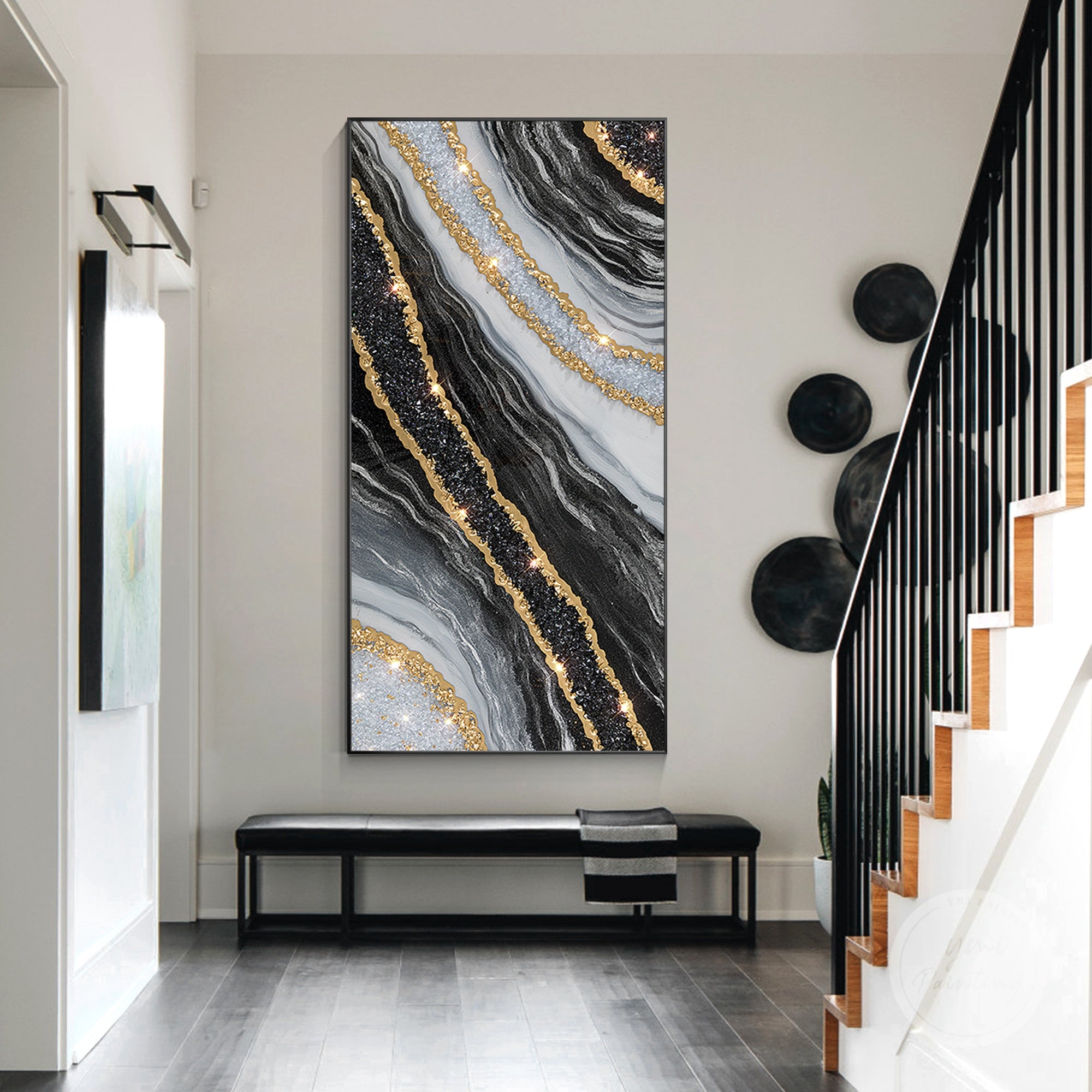 Statement resin wall art with black and gold geode patterns and crystals.
