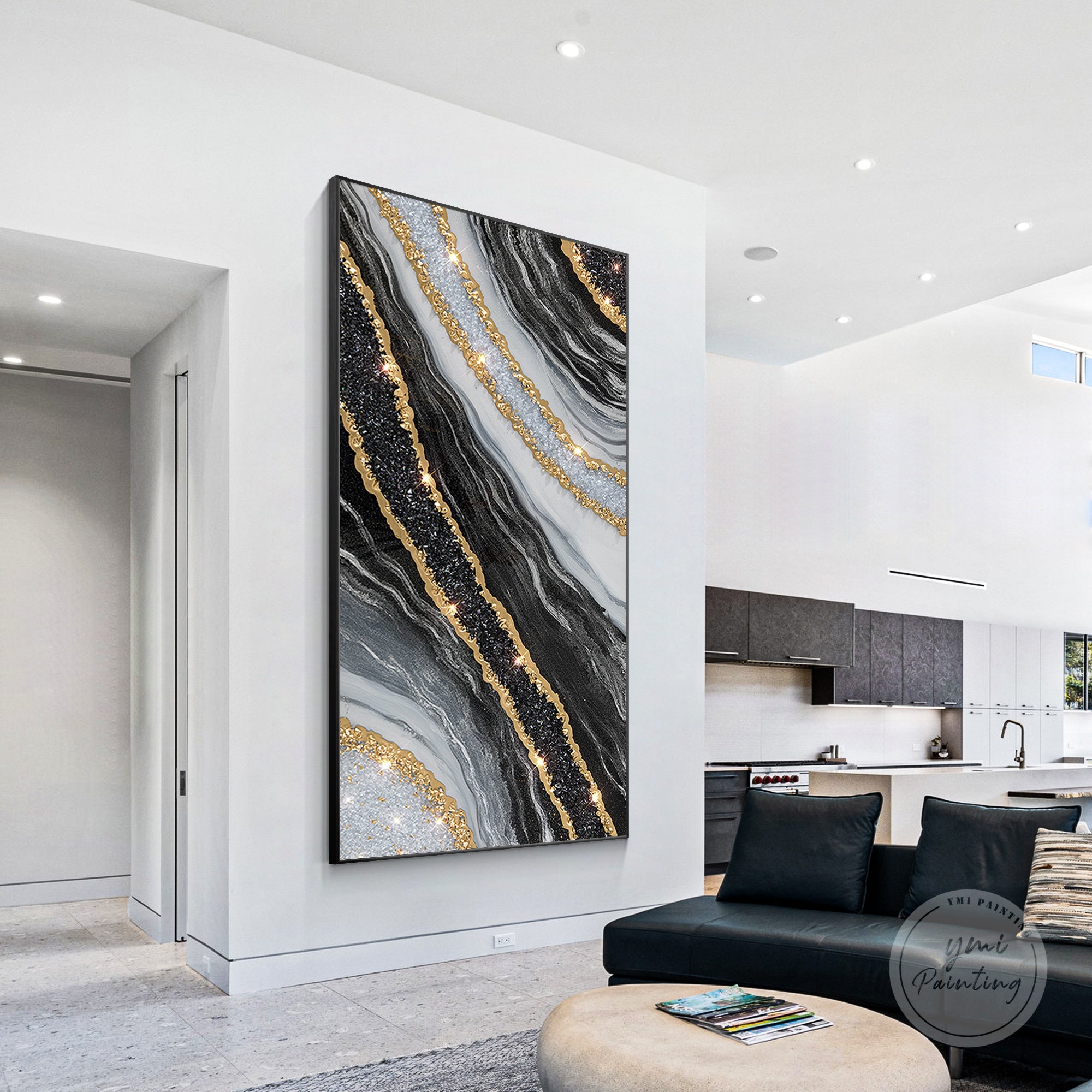 Oversized geode resin artwork with black and gold texture and sparkling crystals.