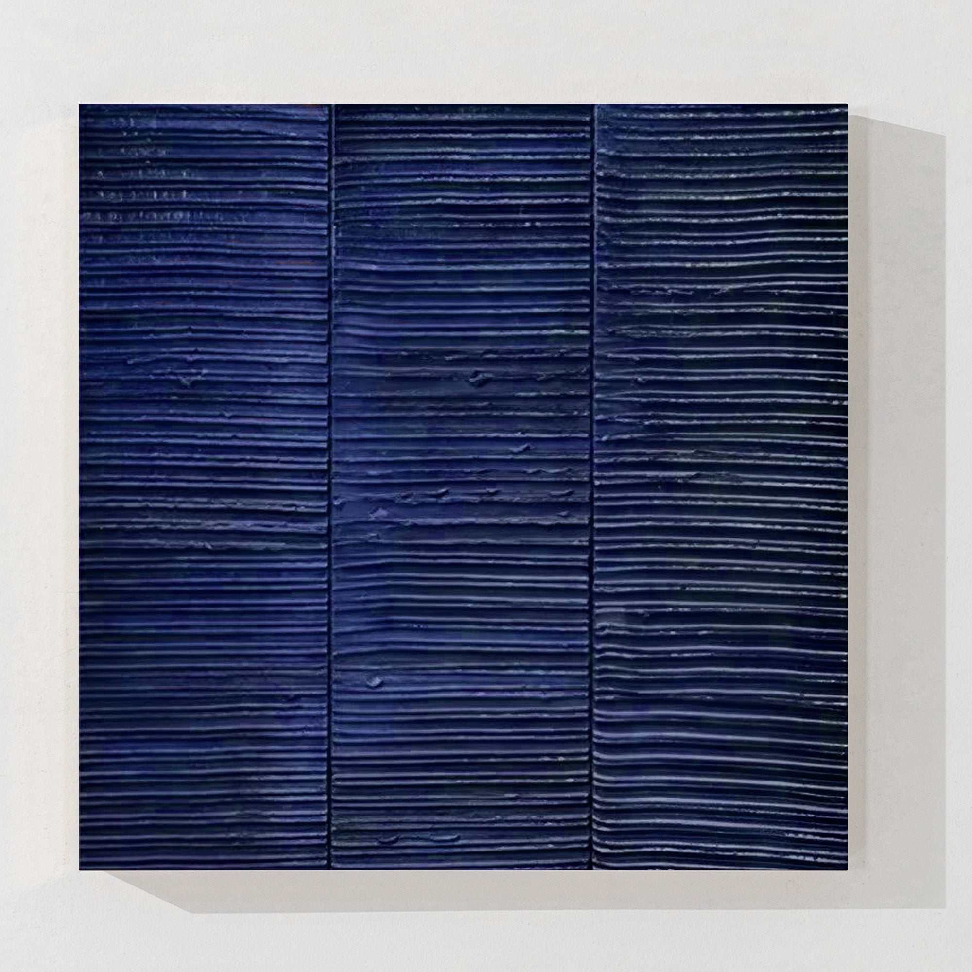Abstract navy blue textured wall art with horizontal line design