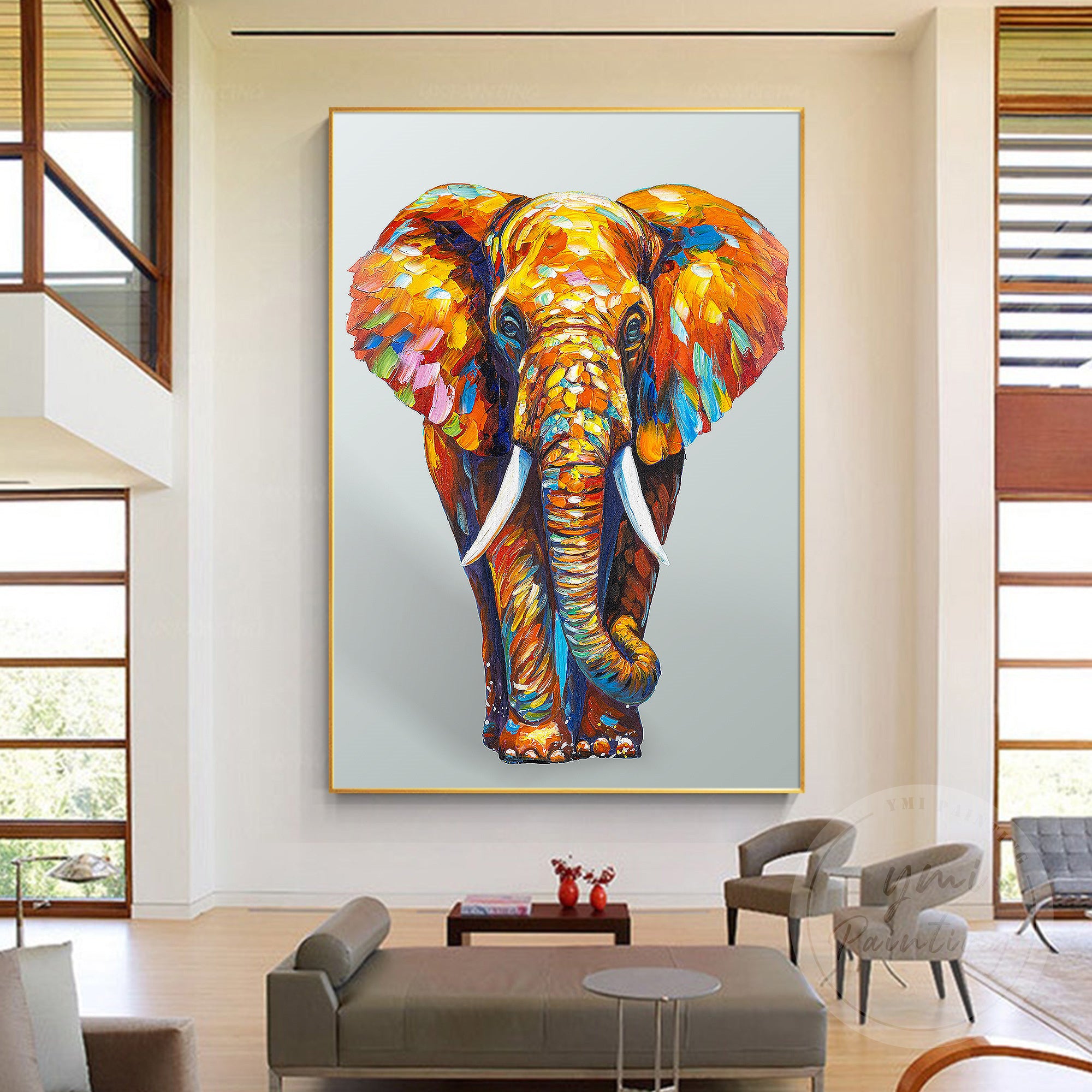 Abstract elephant art with bright pink, orange, and blue tones